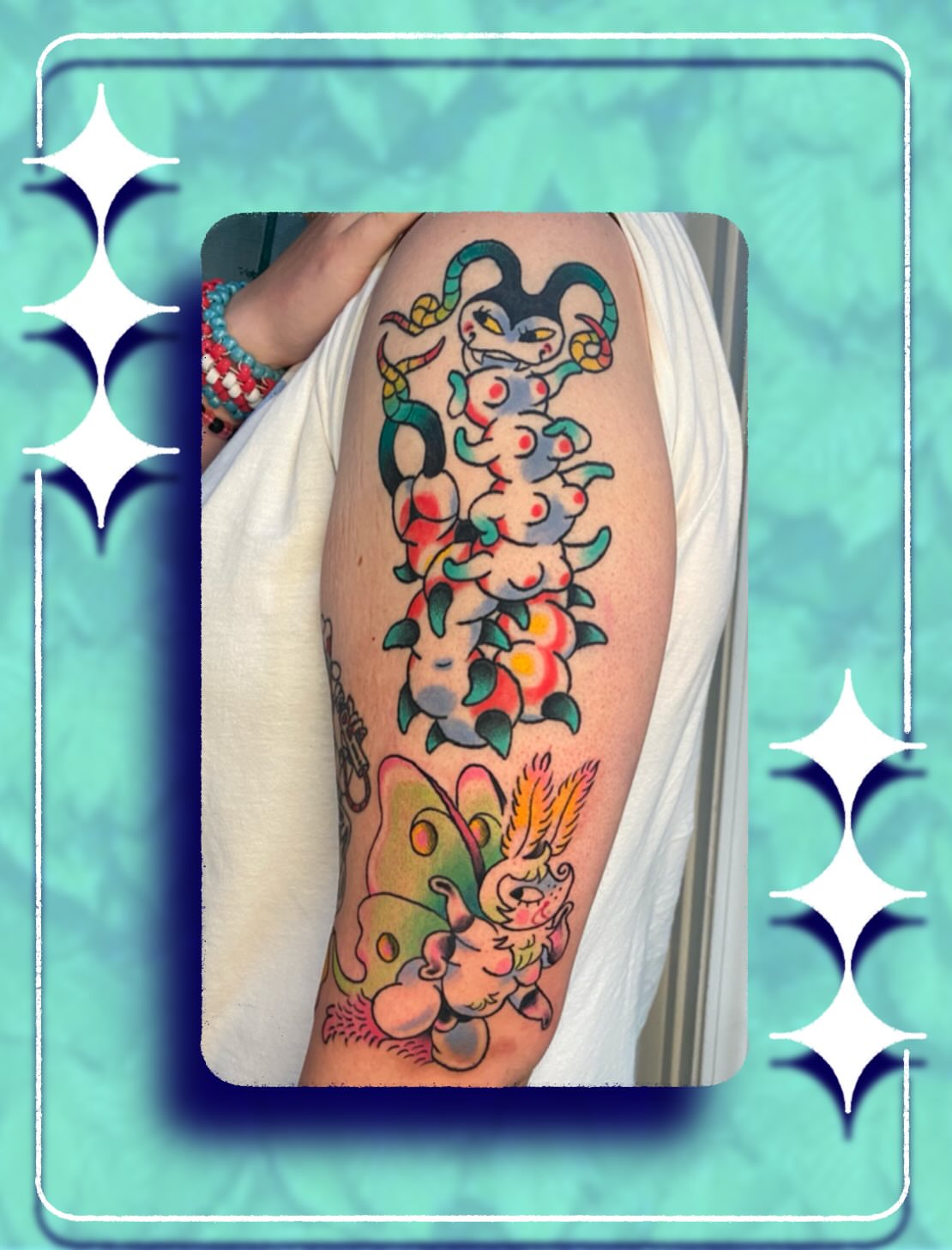 Jester and roses American traditional tattoo on the forearm by Gus Roach Graves