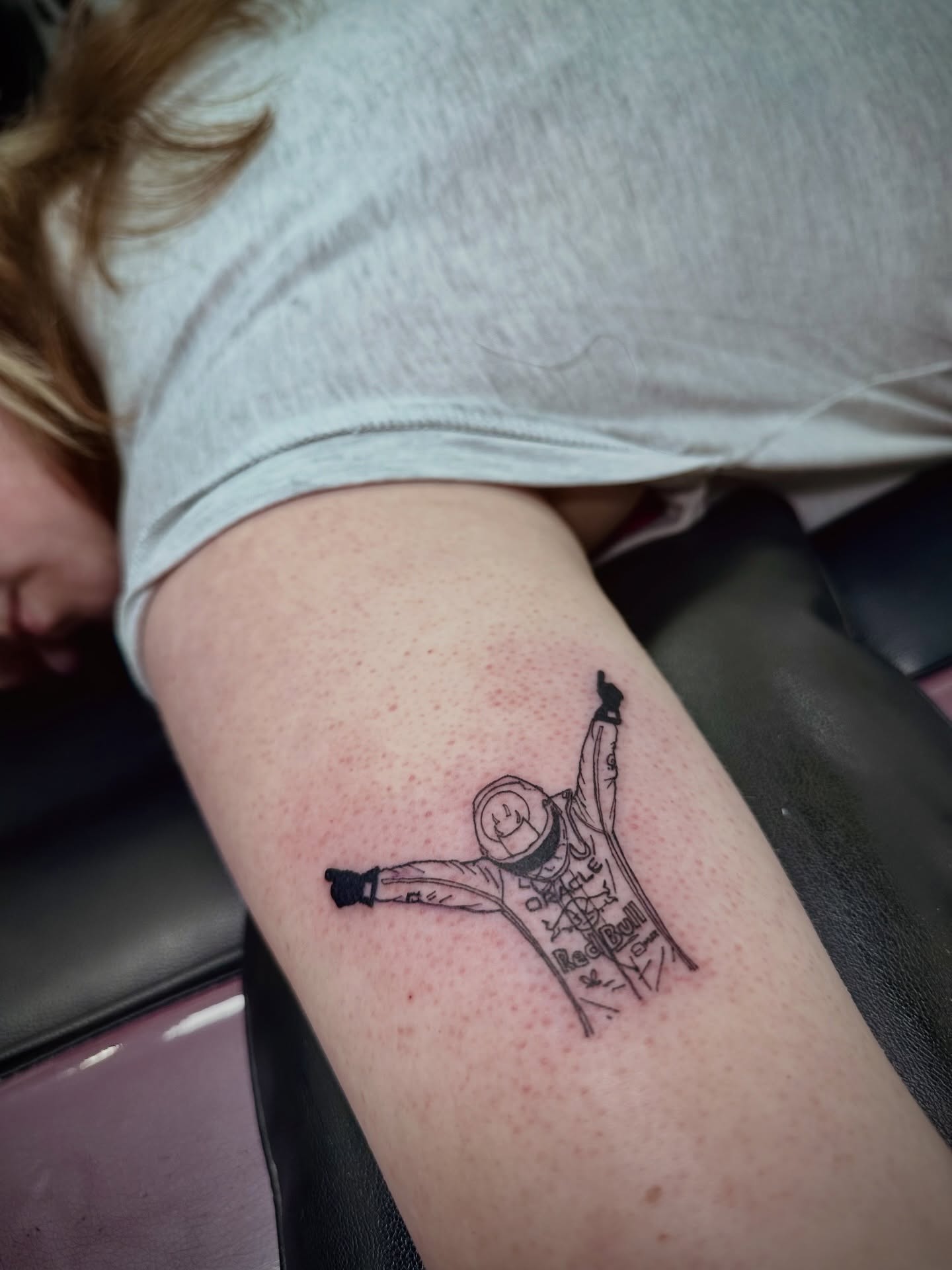Astronaut black and grey tattoo on the forearm by Marlyn “Lala”