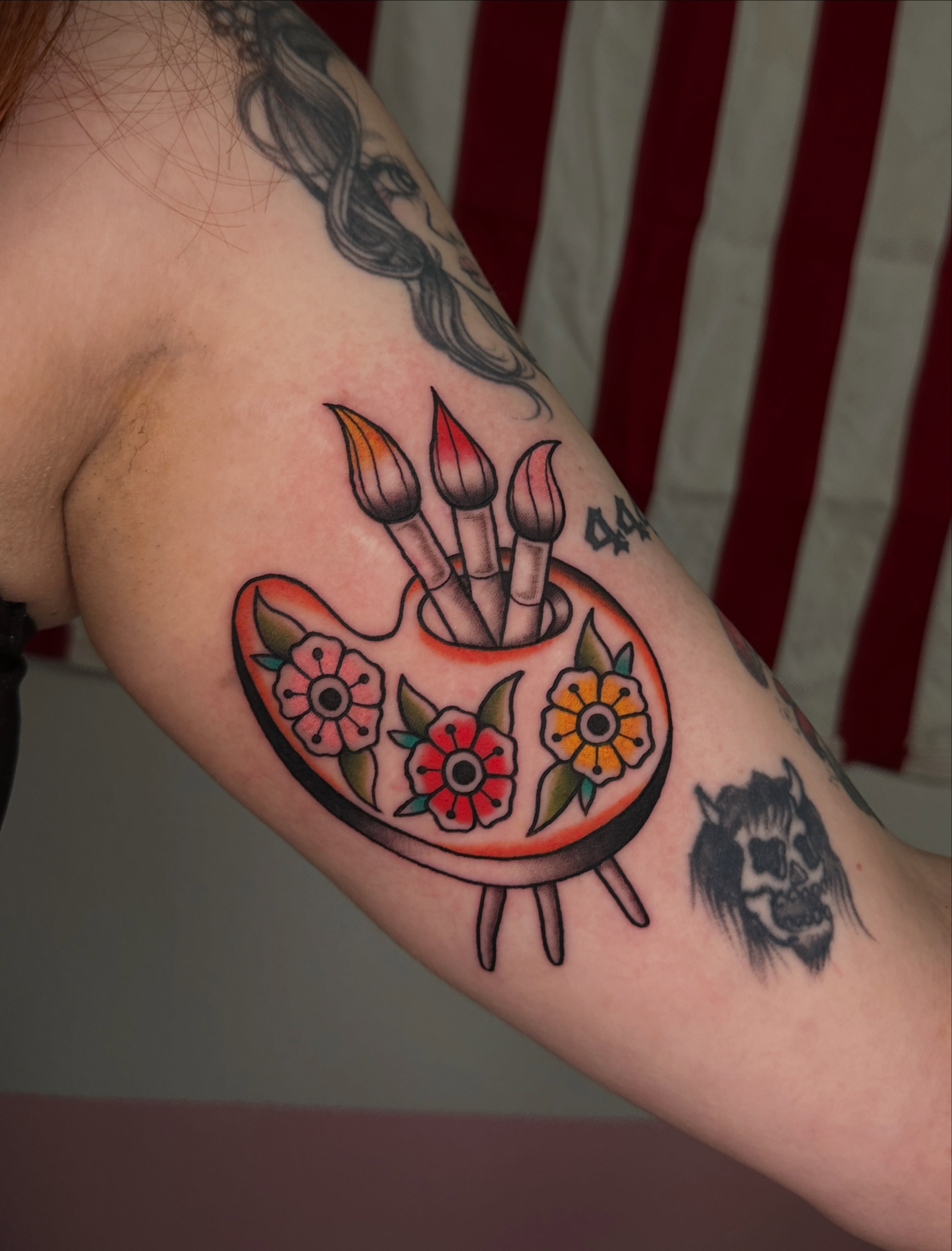 Paint palette with paintbrushes American traditional tattoo on the forearm by ⊹₊⟡⋆ 𝕵𝖔𝖎𝖊 ⊹₊⟡⋆