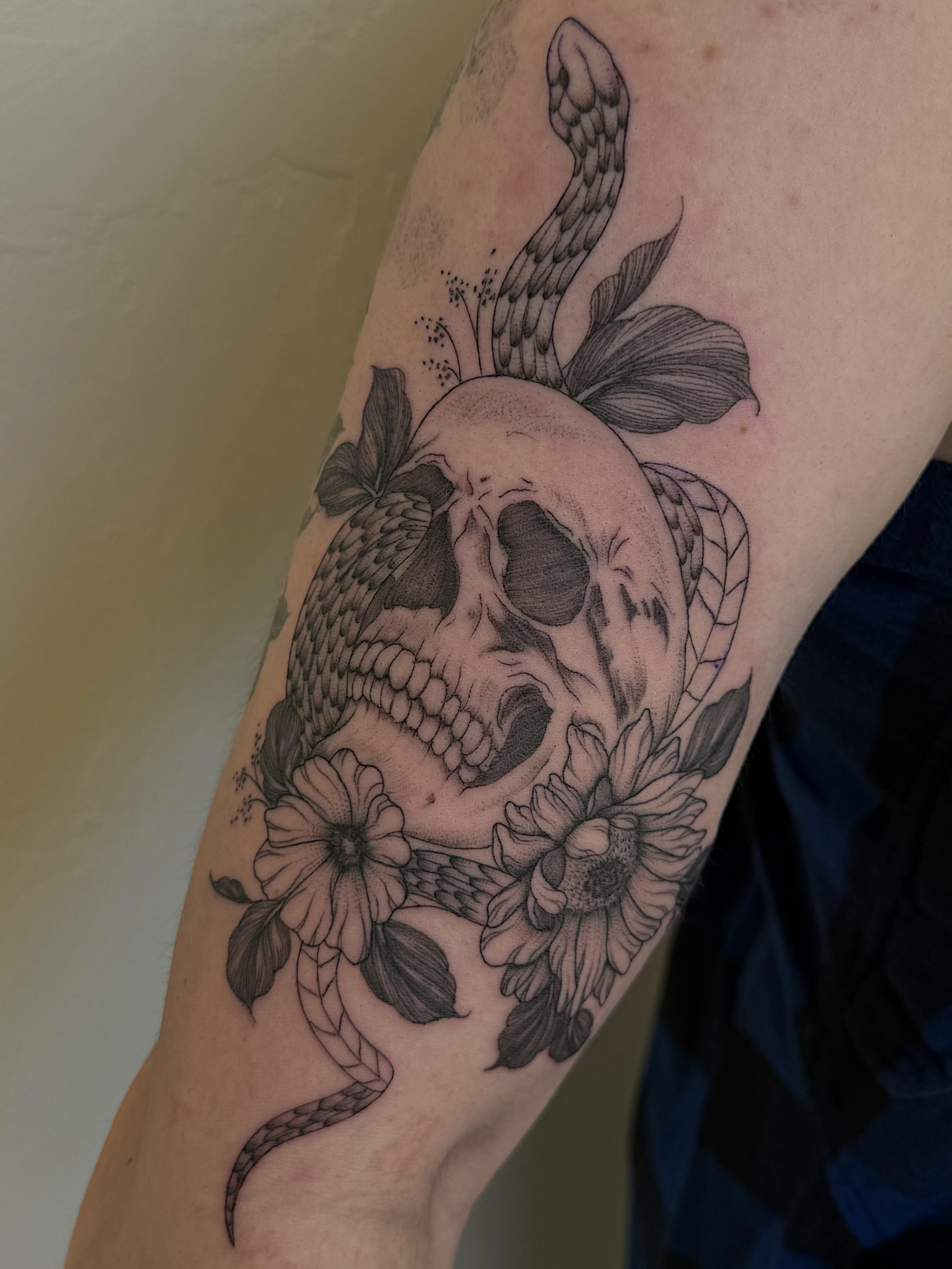 Skull and snake realism tattoo on the forearm by Shelby Lynn Bayles, Ogden, Utah