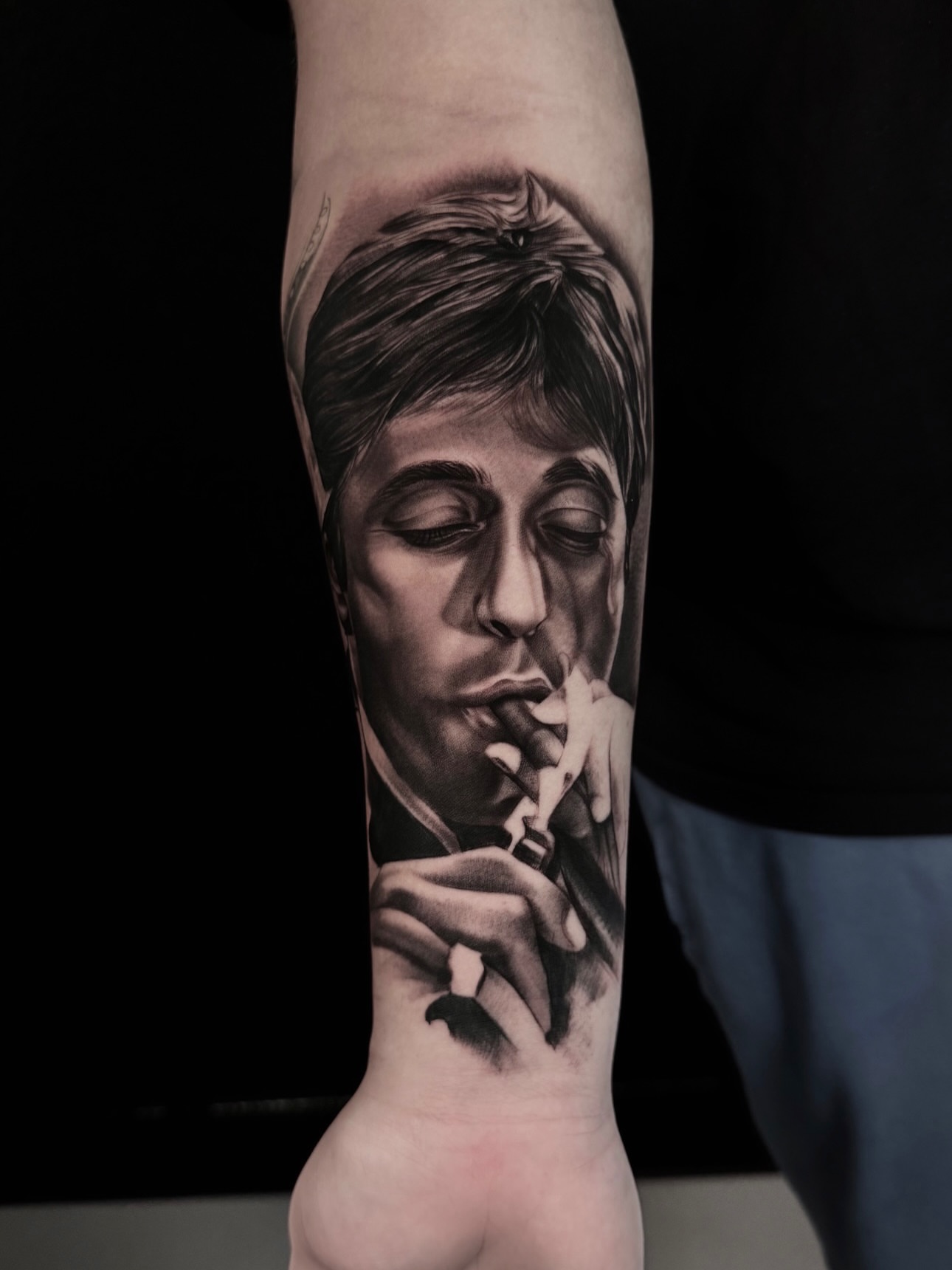 Smoking man realism tattoo on the forearm by Yudel