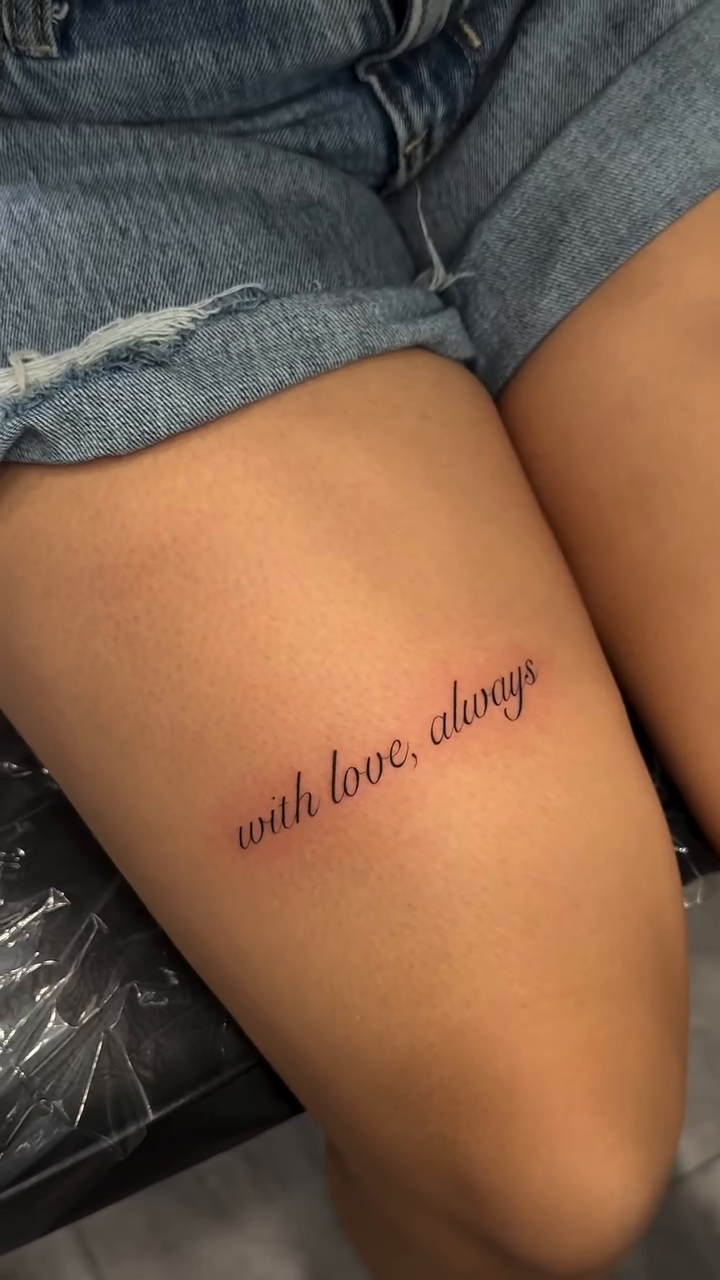 Script tattoo on thigh lettering tattoo on the leg by Jennifer Garcia R - Vegas tattoo artist