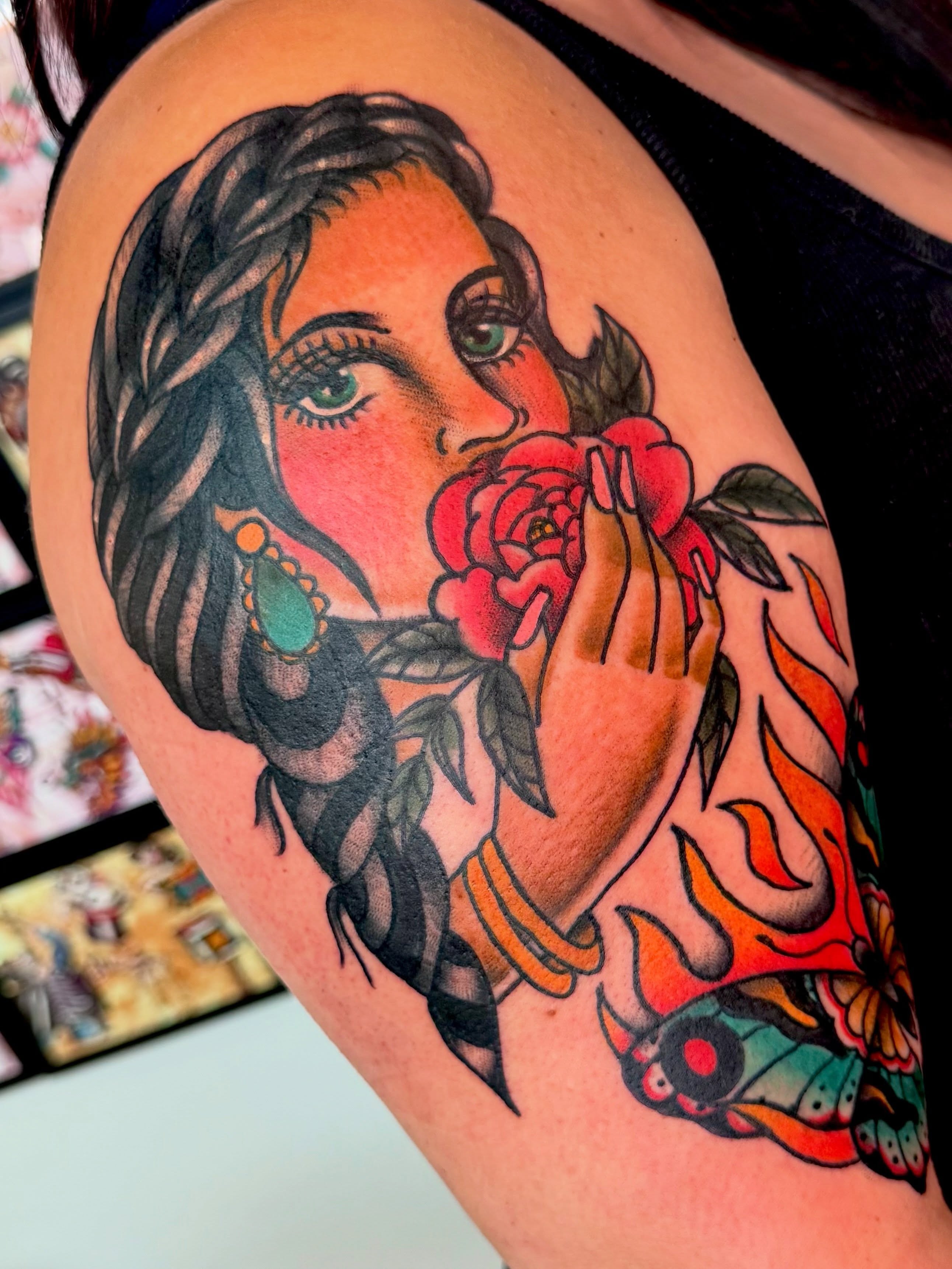 Woman with rose American traditional tattoo on the shoulder by 🪩 Marisa Rae Mathews 🪩, McKees Rocks, Pennsylvania