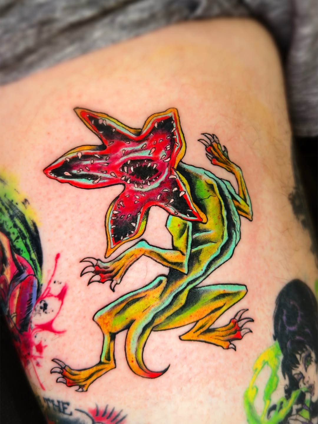 Demogorgon from Stranger Things American traditional tattoo on the thigh by Lex
