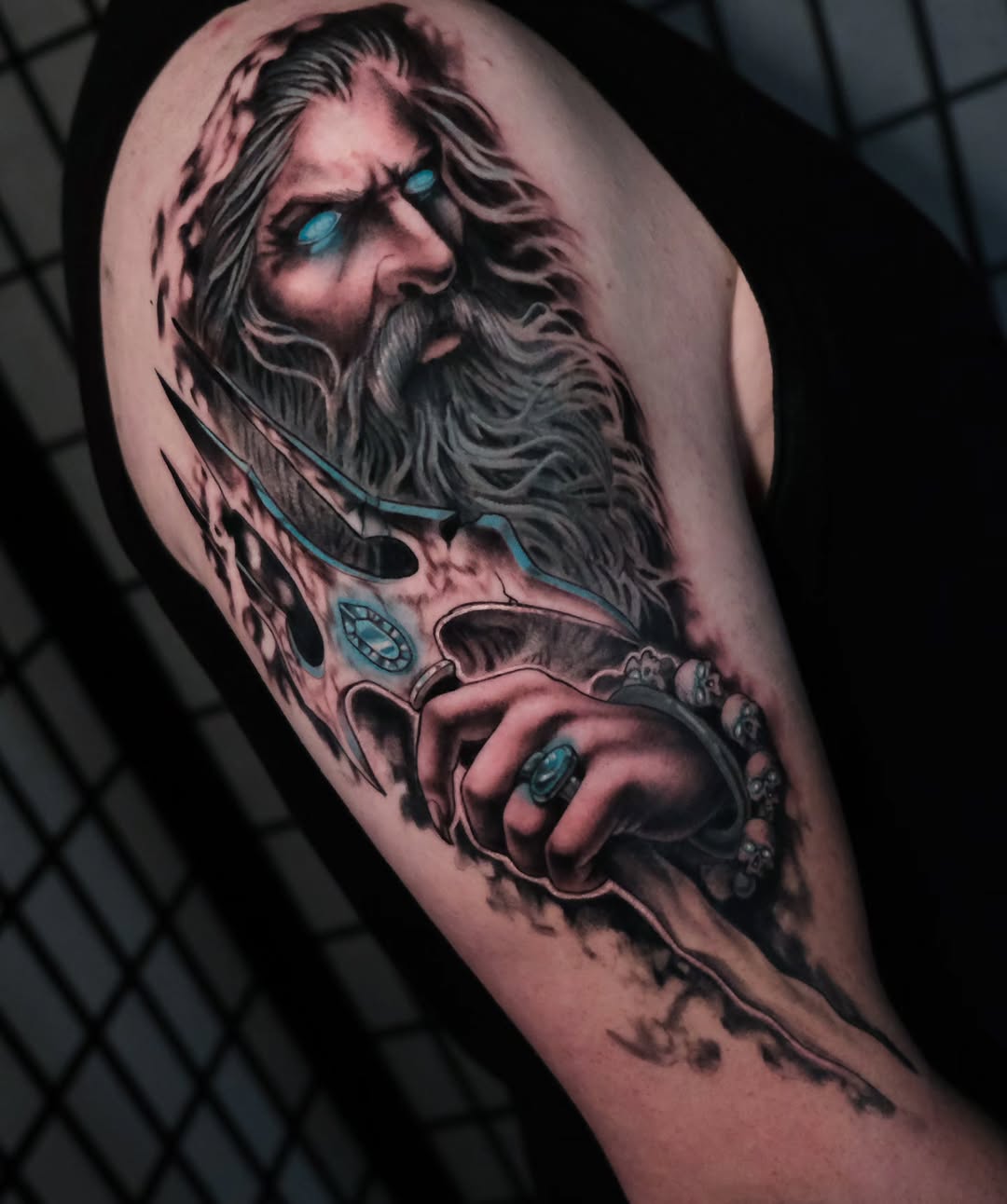 Zeus holding a trident realism tattoo on the forearm by Tash  - Seattle Tattoo Artist