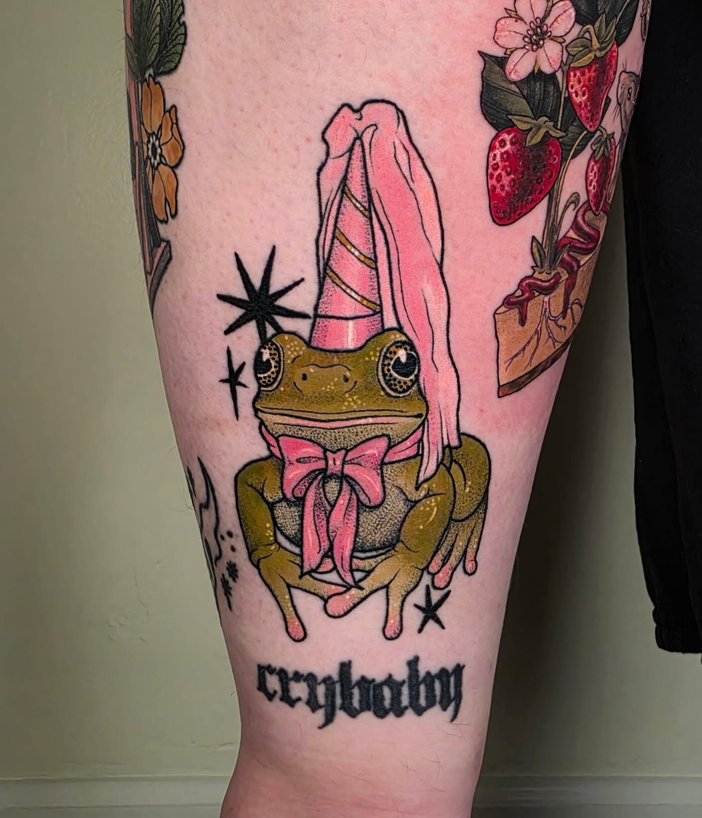 Frog with unicorn horn new school tattoo on the forearm by leanna patterson, Ruston, Louisiana