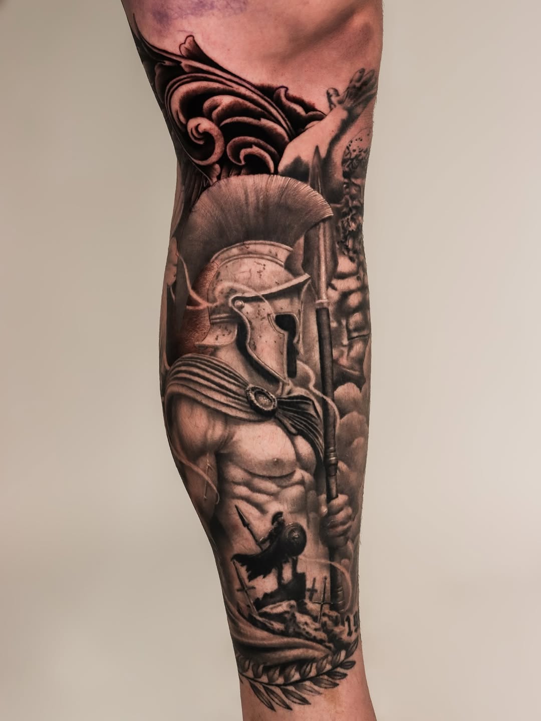 Spartan warrior with helmet and spear realism tattoo on the forearm by Jeff Reindel
