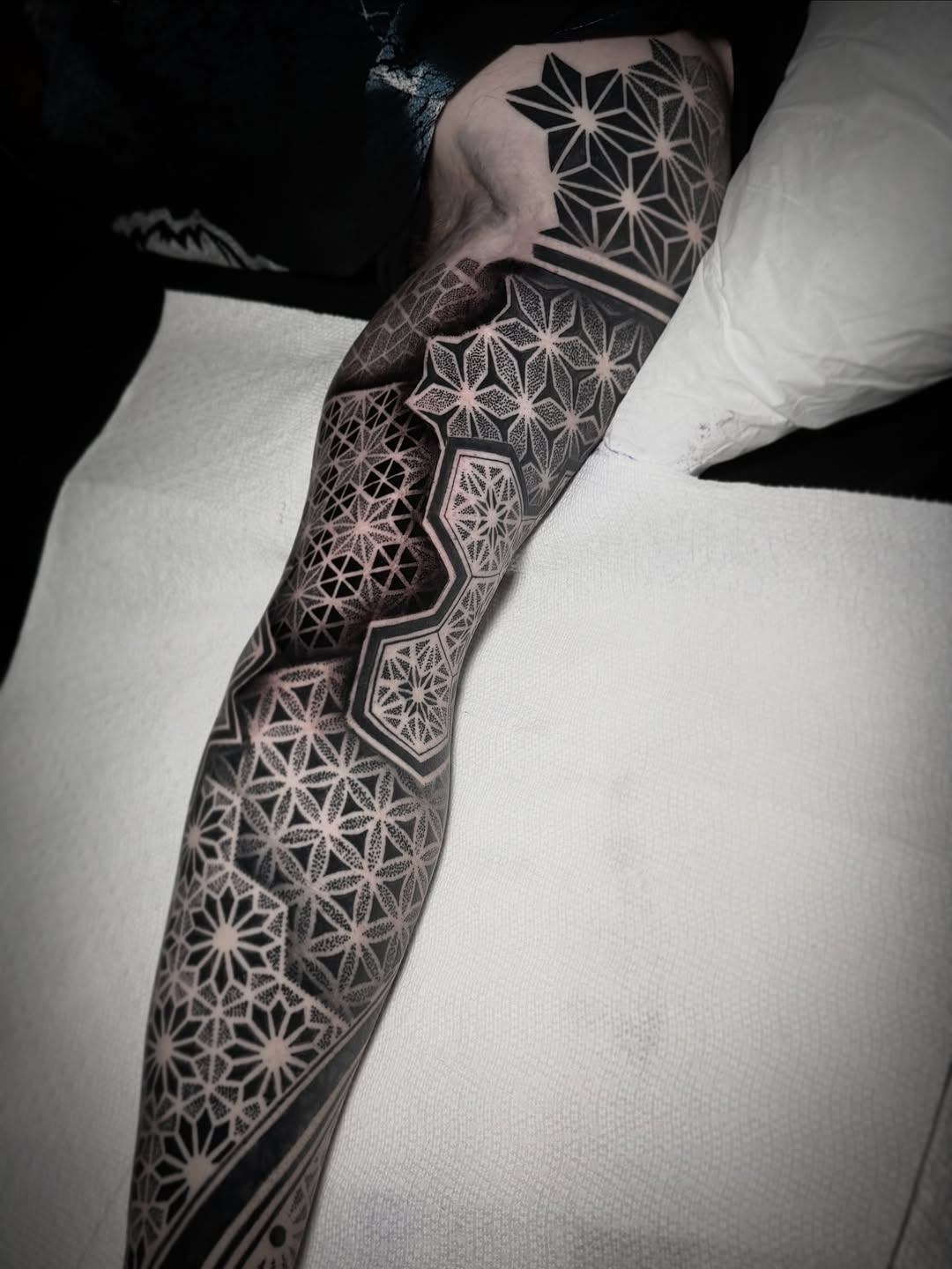 Geometric patterns geometric tattoo on the forearm by David Mushaney