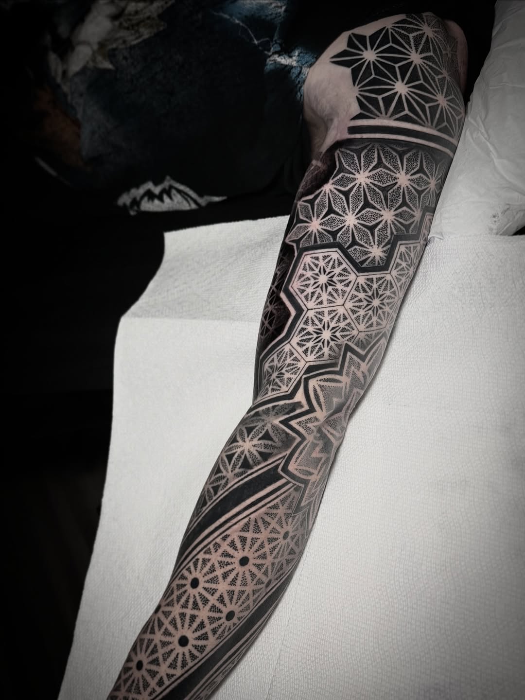 Geometric patterns geometric tattoo on the forearm by David Mushaney