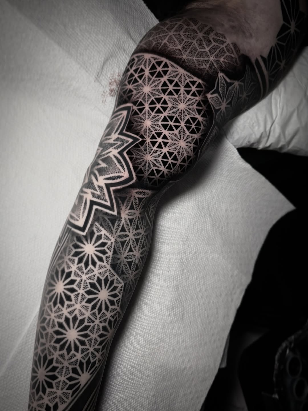 Geometric patterns geometric tattoo on the forearm by David Mushaney
