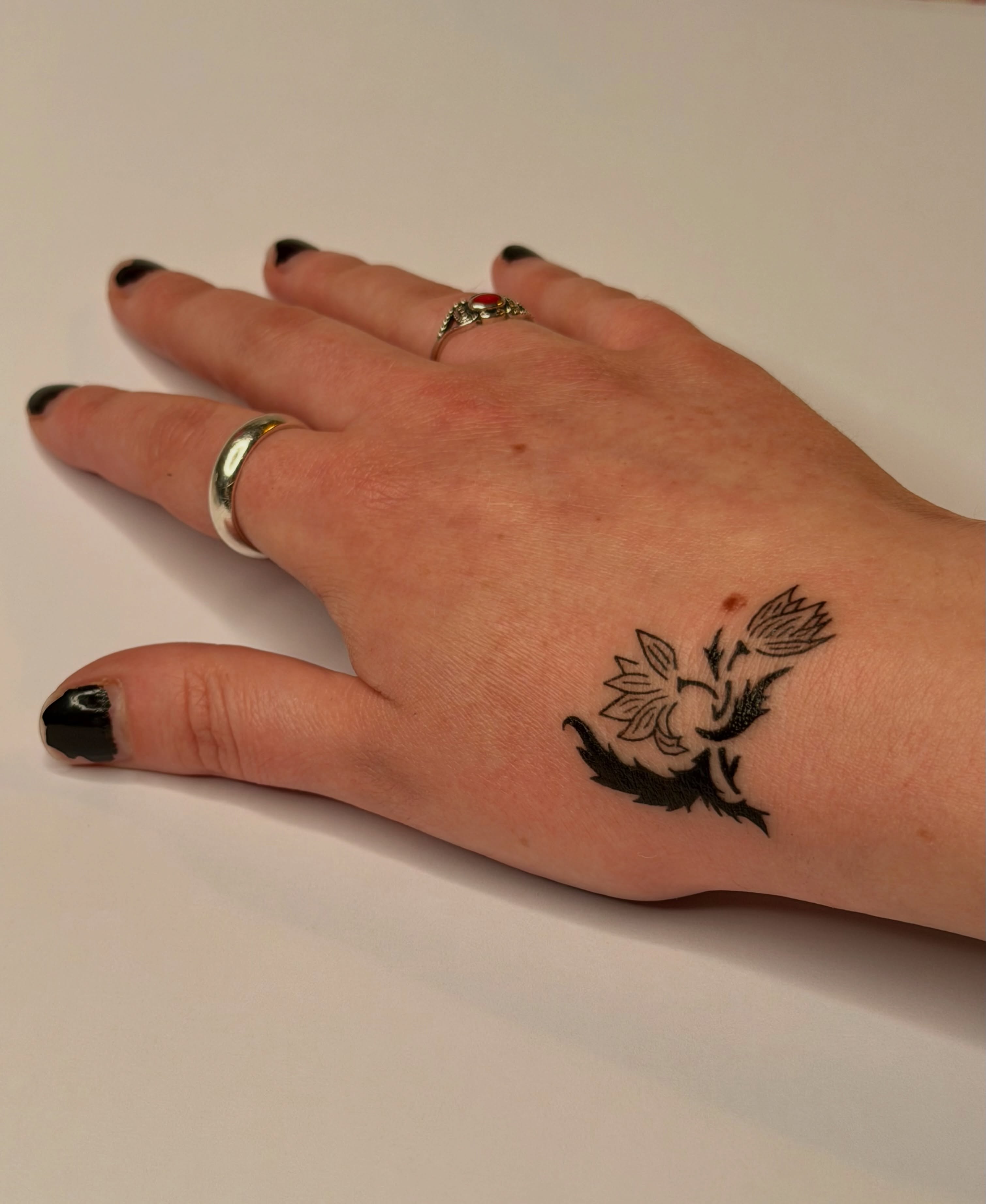 Flower black and grey tattoo on the hand by ♤ Catherine Stengel ♤
