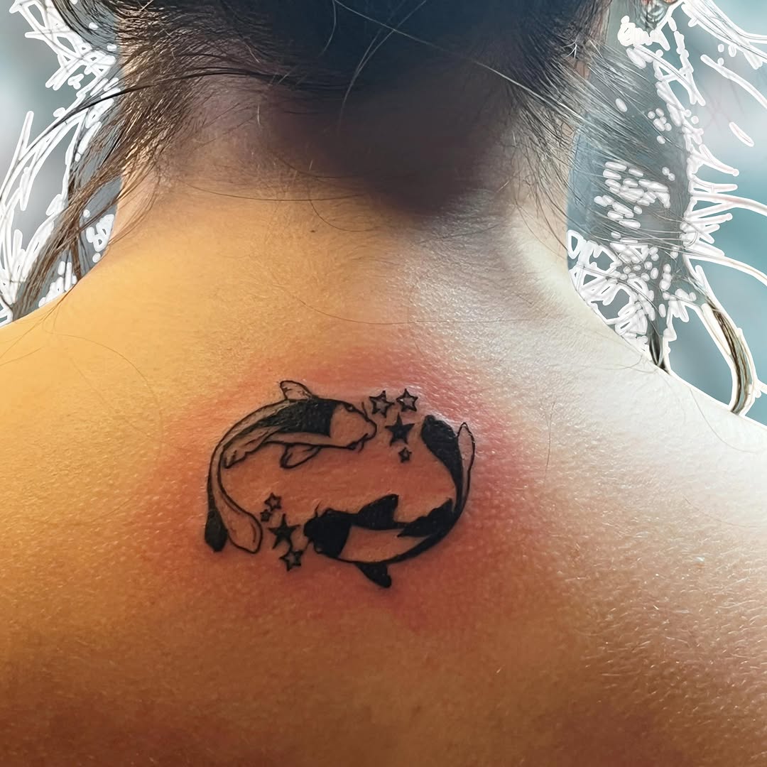 Two koi fish with stars fine line tattoo on the neck by ❦julia