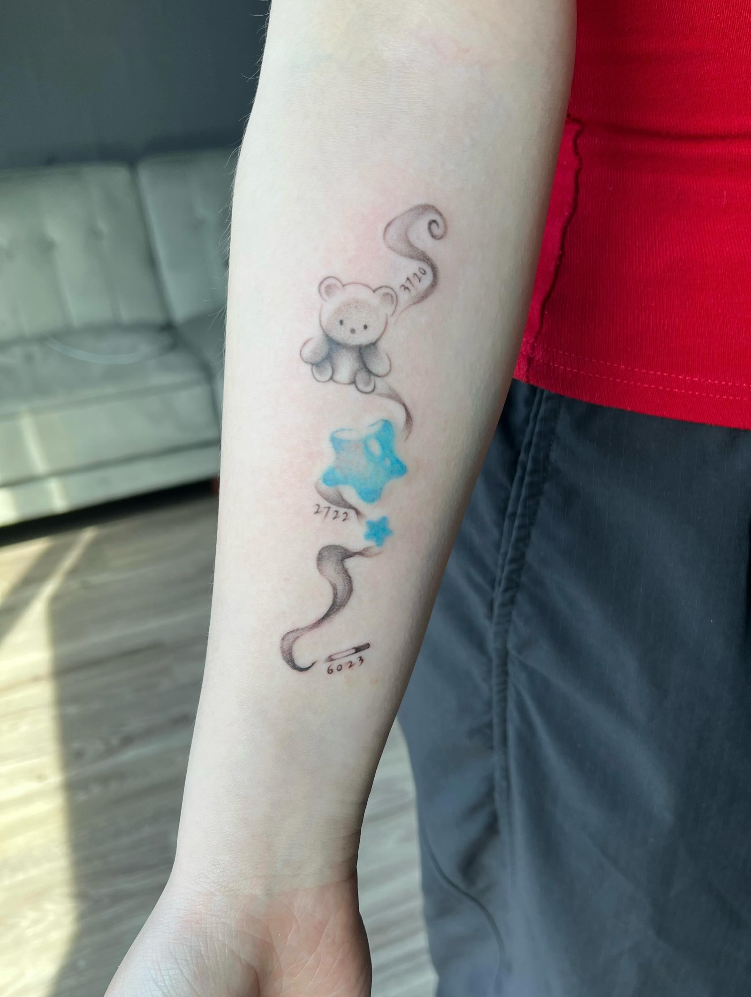 Teddy bear and star dotwork tattoo on the forearm by Haiiitattoo