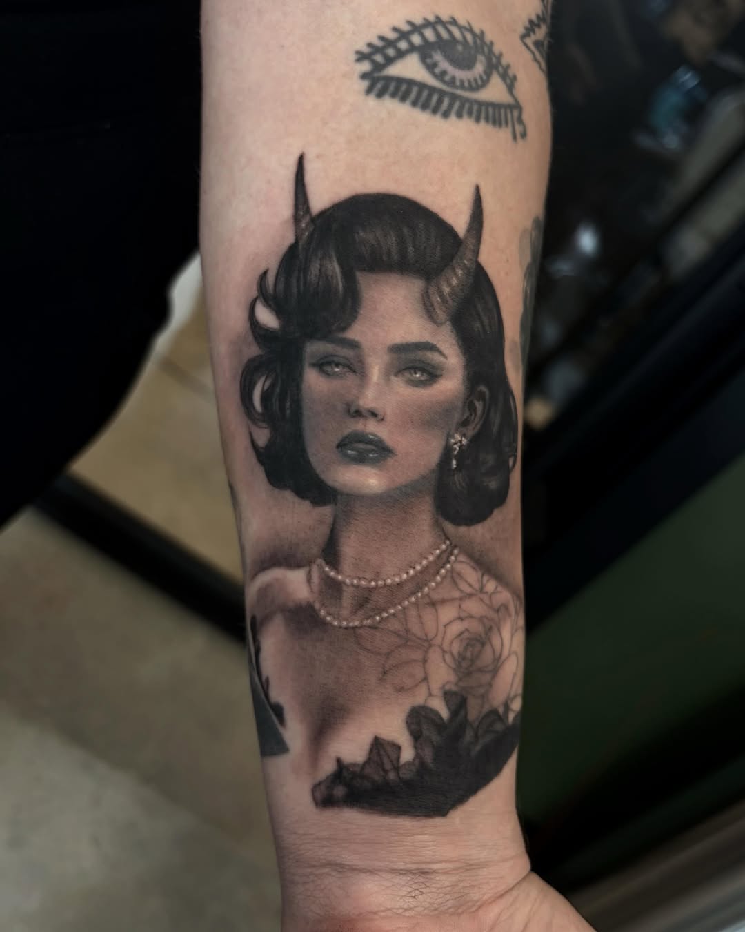Devil woman portrait realism tattoo on the forearm by Jazz