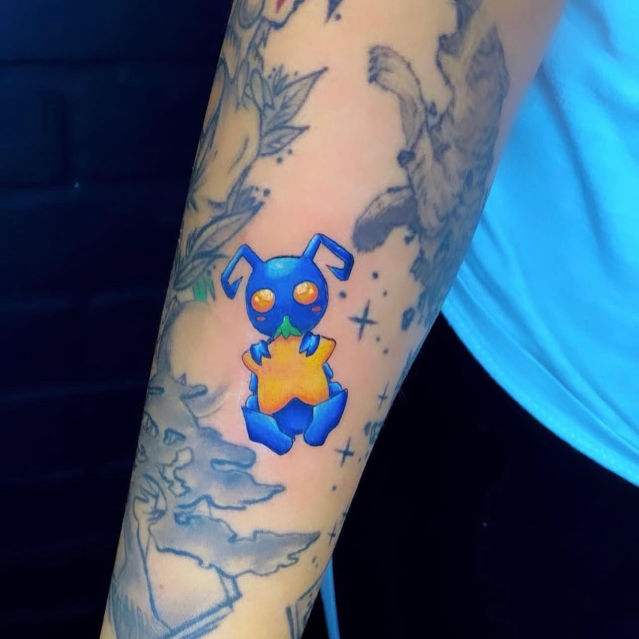 Blue dog with star dotwork tattoo on the forearm by David Carras-pol, Miramar, Florida