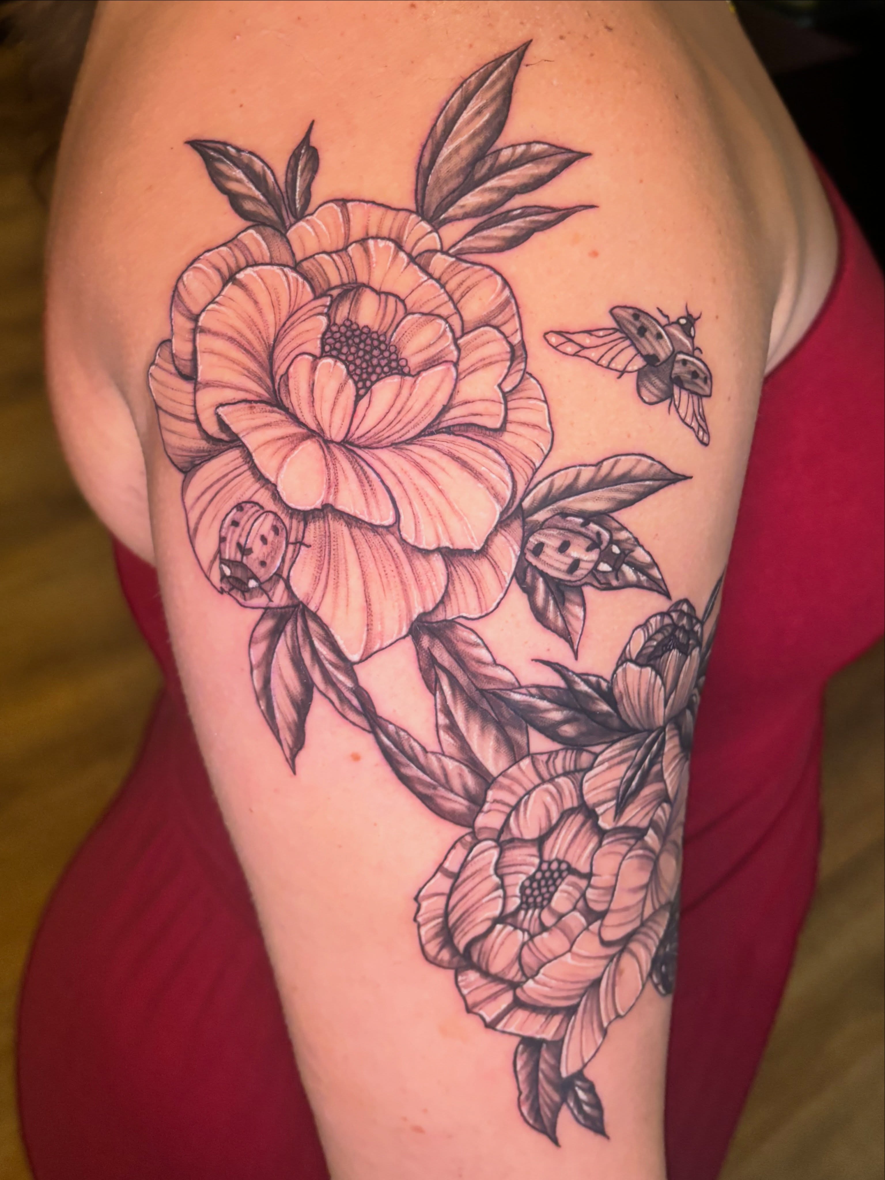 Peonies and ladybugs dotwork tattoo on the shoulder by Kiwi🌱☀️