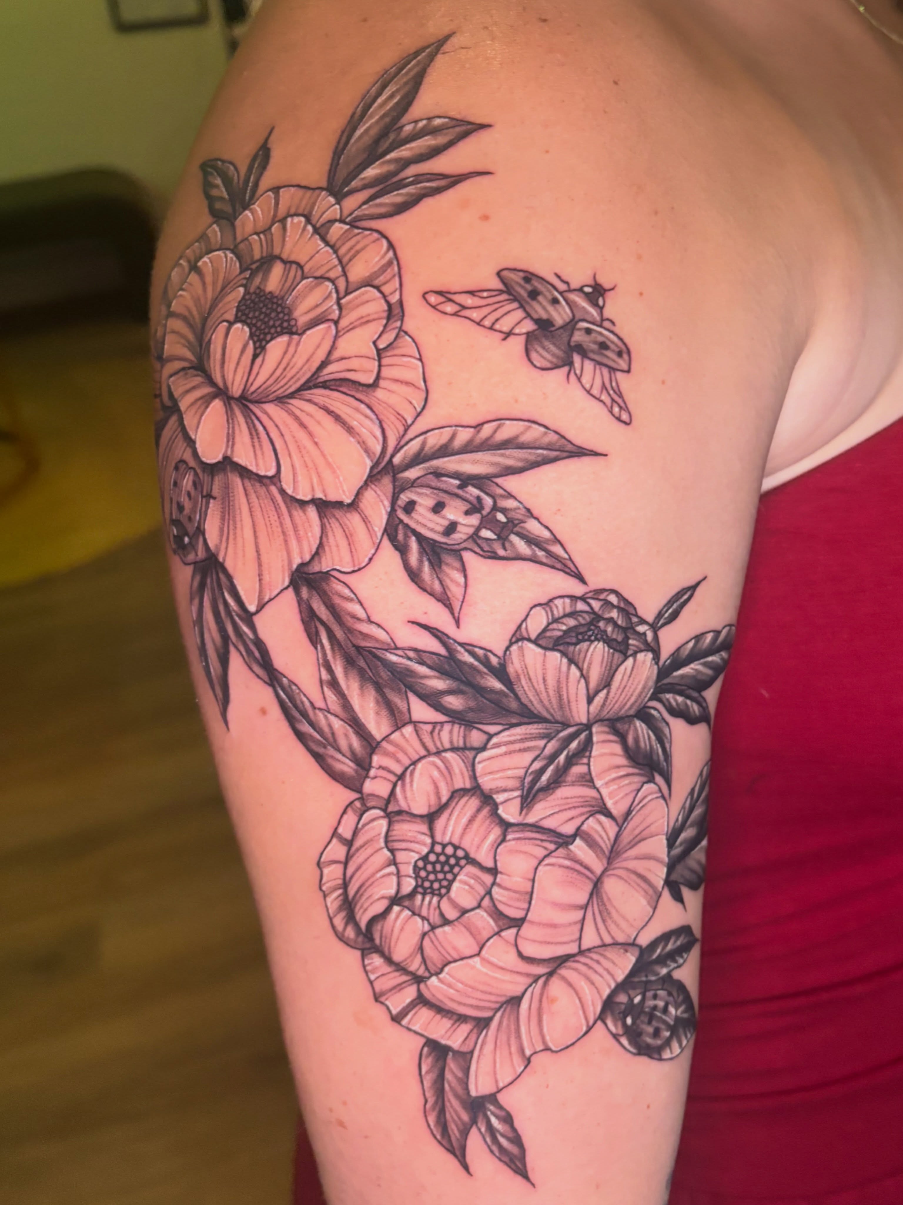 Peonies and ladybugs dotwork tattoo on the shoulder by Kiwi🌱☀️