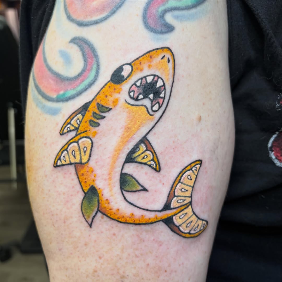 Shark American traditional tattoo on the thigh by Hailey Hermosillo
