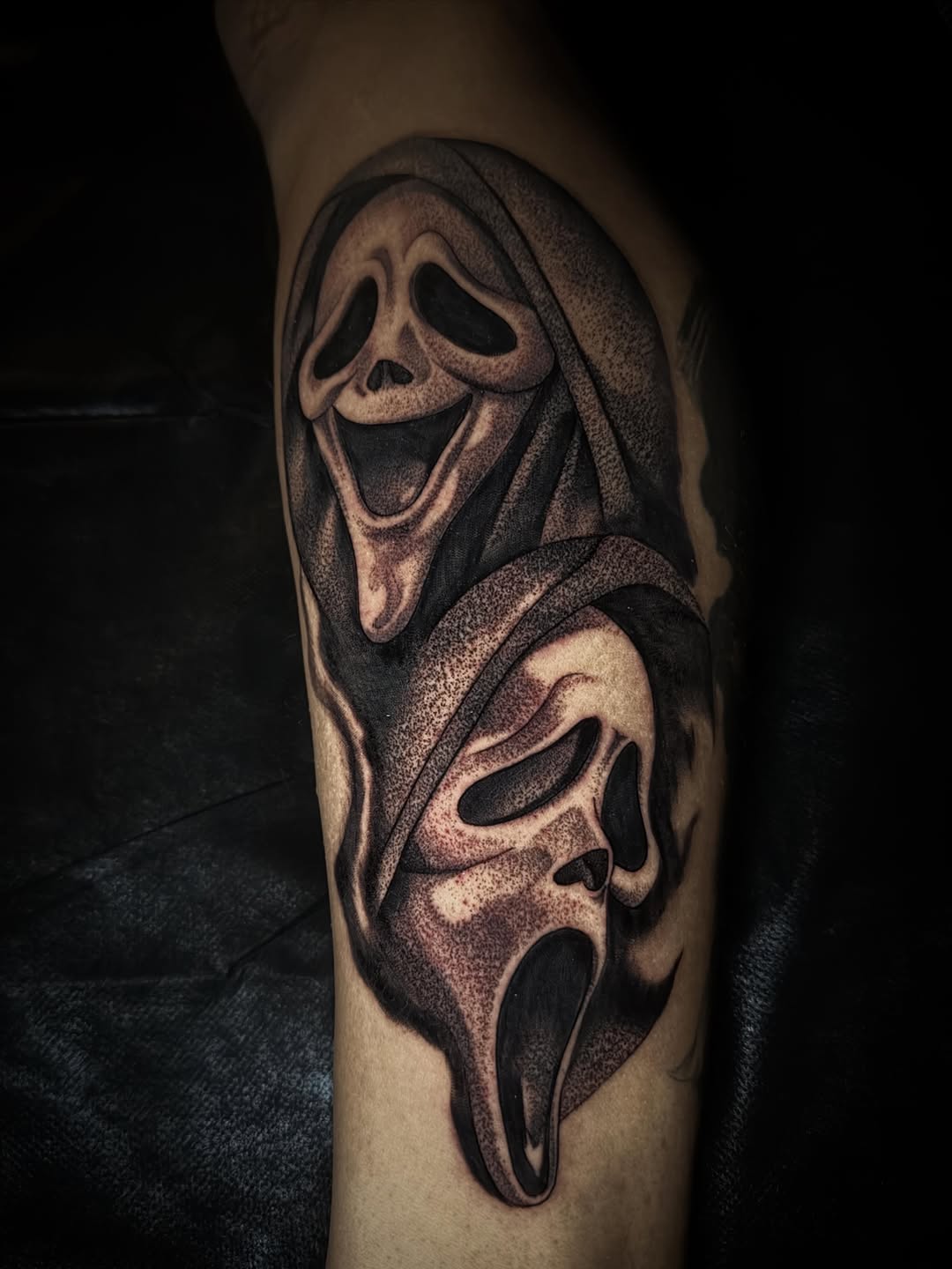 Ghostface masks from Scream realism tattoo on the forearm by Bruce becerra tattoos