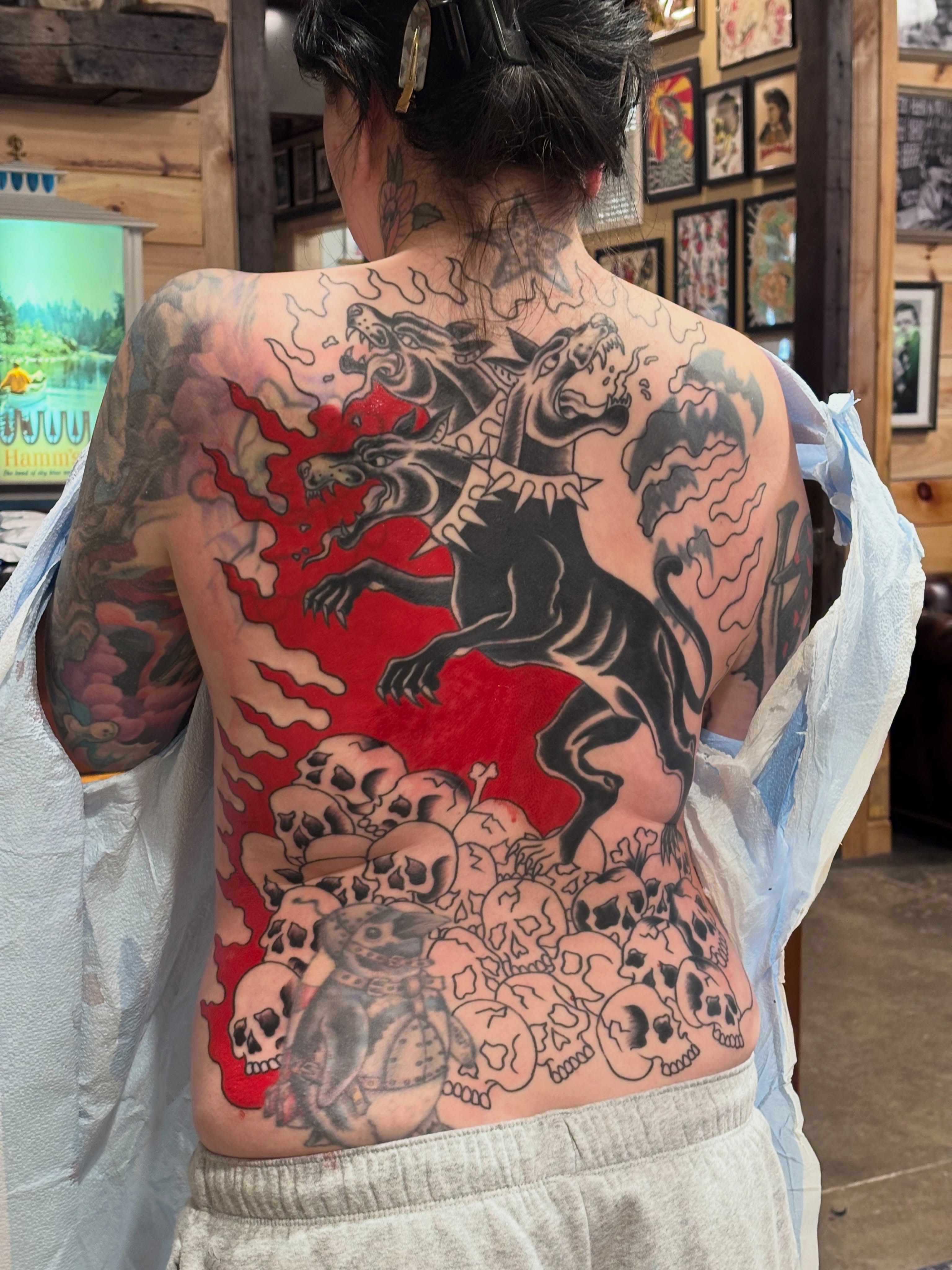 Wolf and skulls American traditional tattoo on the back by ★ ★ ★ Matt Reinstone ★ ★ ★
