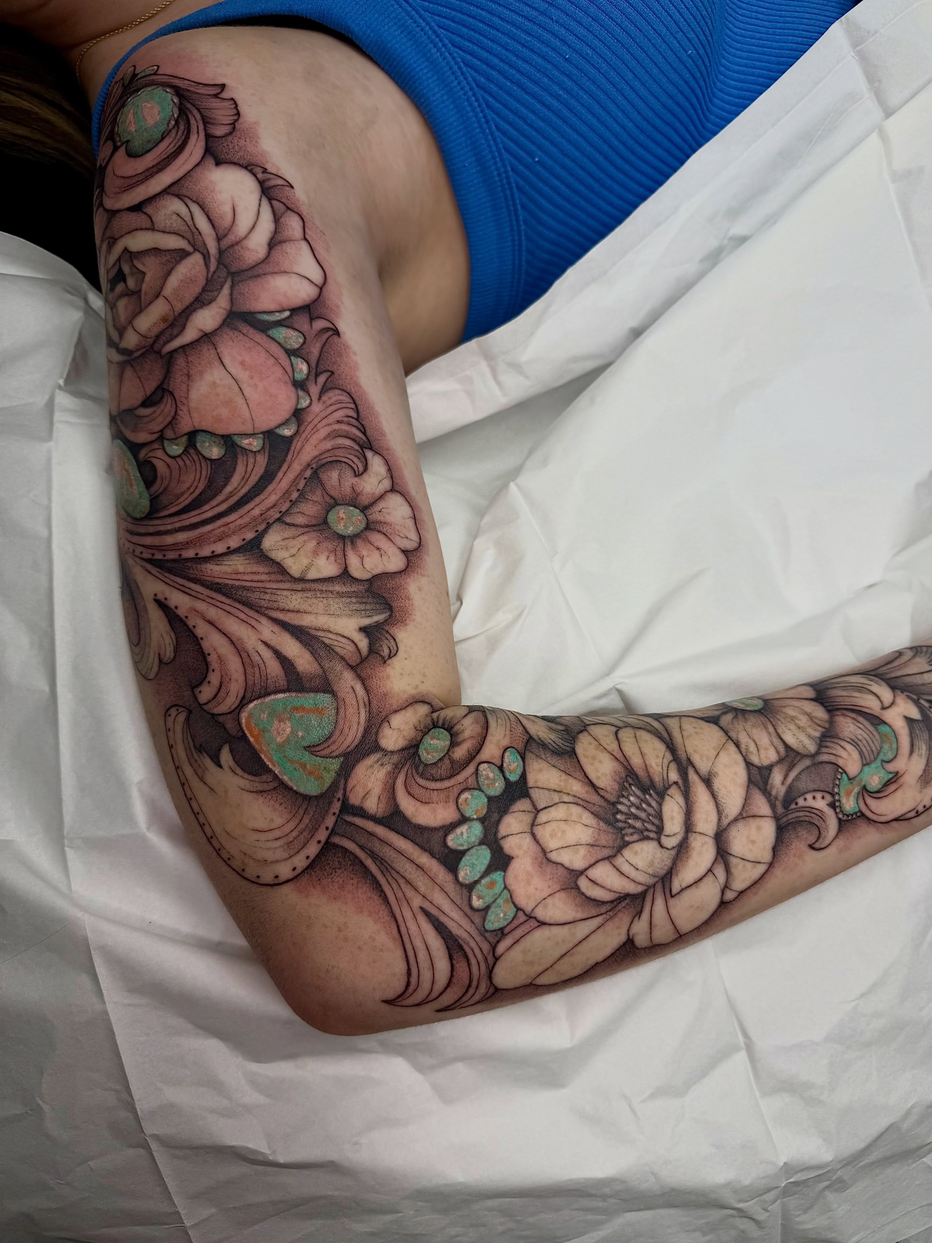 Floral bouquet japanese irezumi tattoo on the forearm by Halle Cooper