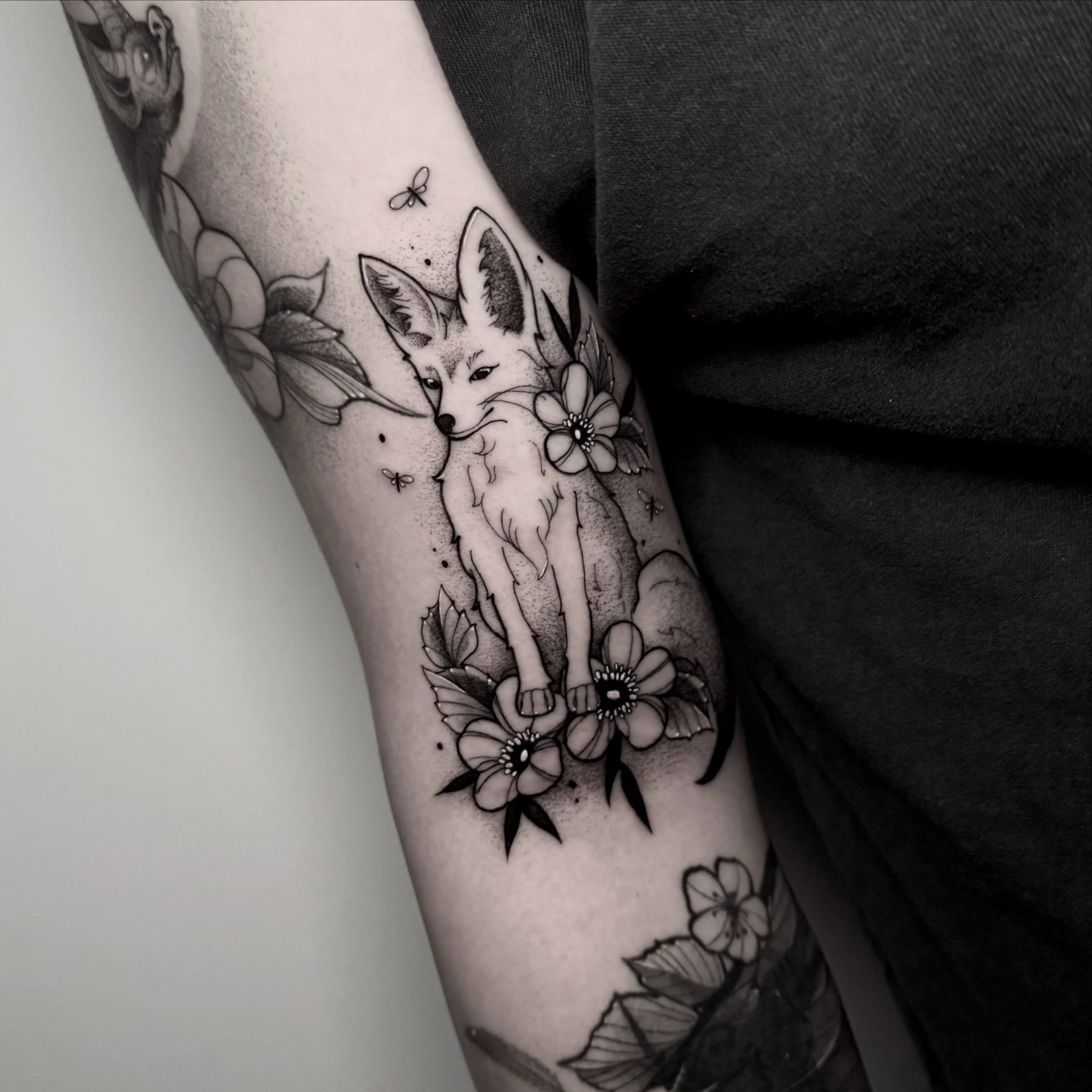 Fox and flowers dotwork tattoo on the forearm by ɪᴠᴏɴɴᴇ