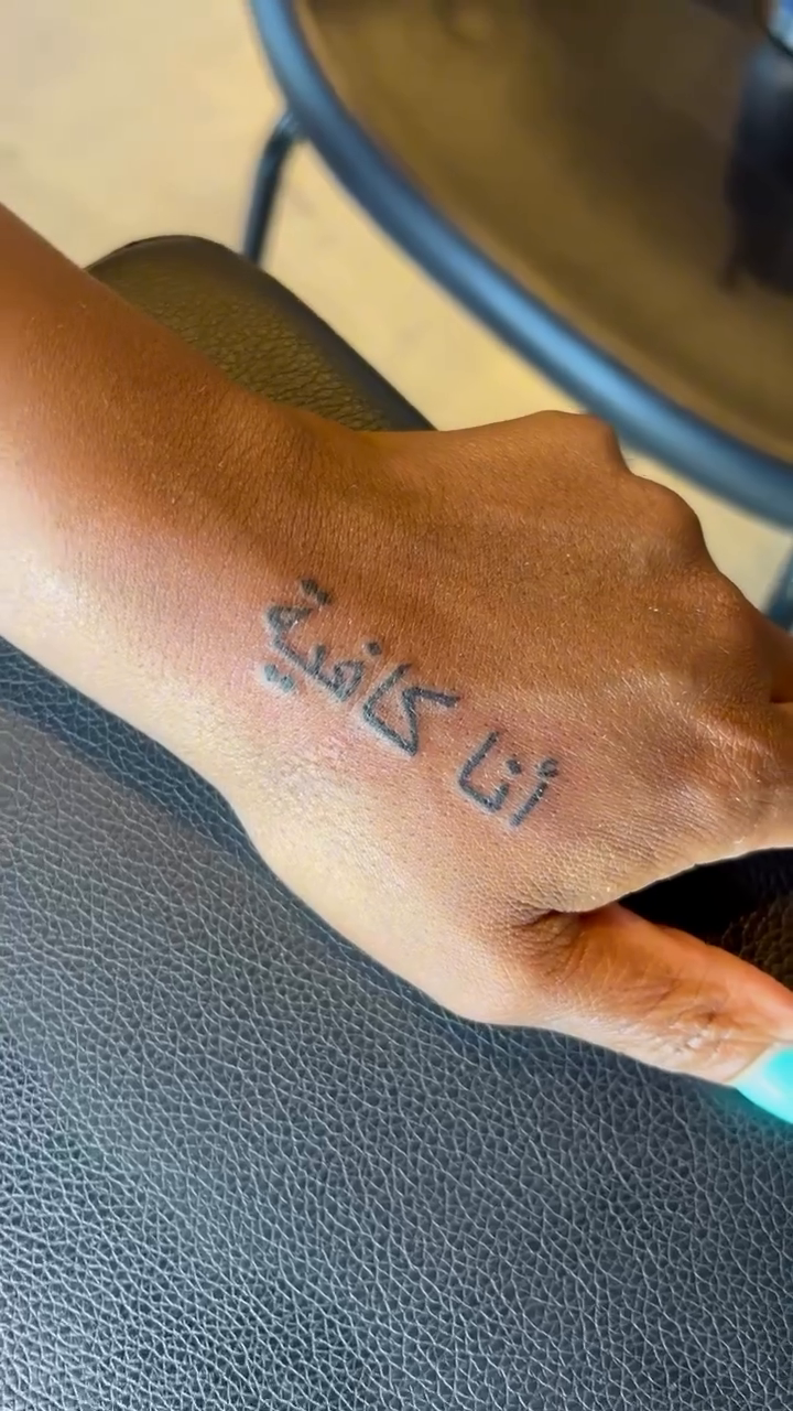 Arabic script on hand lettering tattoo on the forearm by Jazz Walker