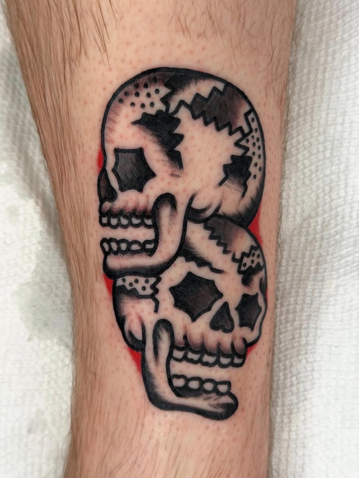 Skulls black and grey tattoo on the forearm by لا Kenny McCabe لا