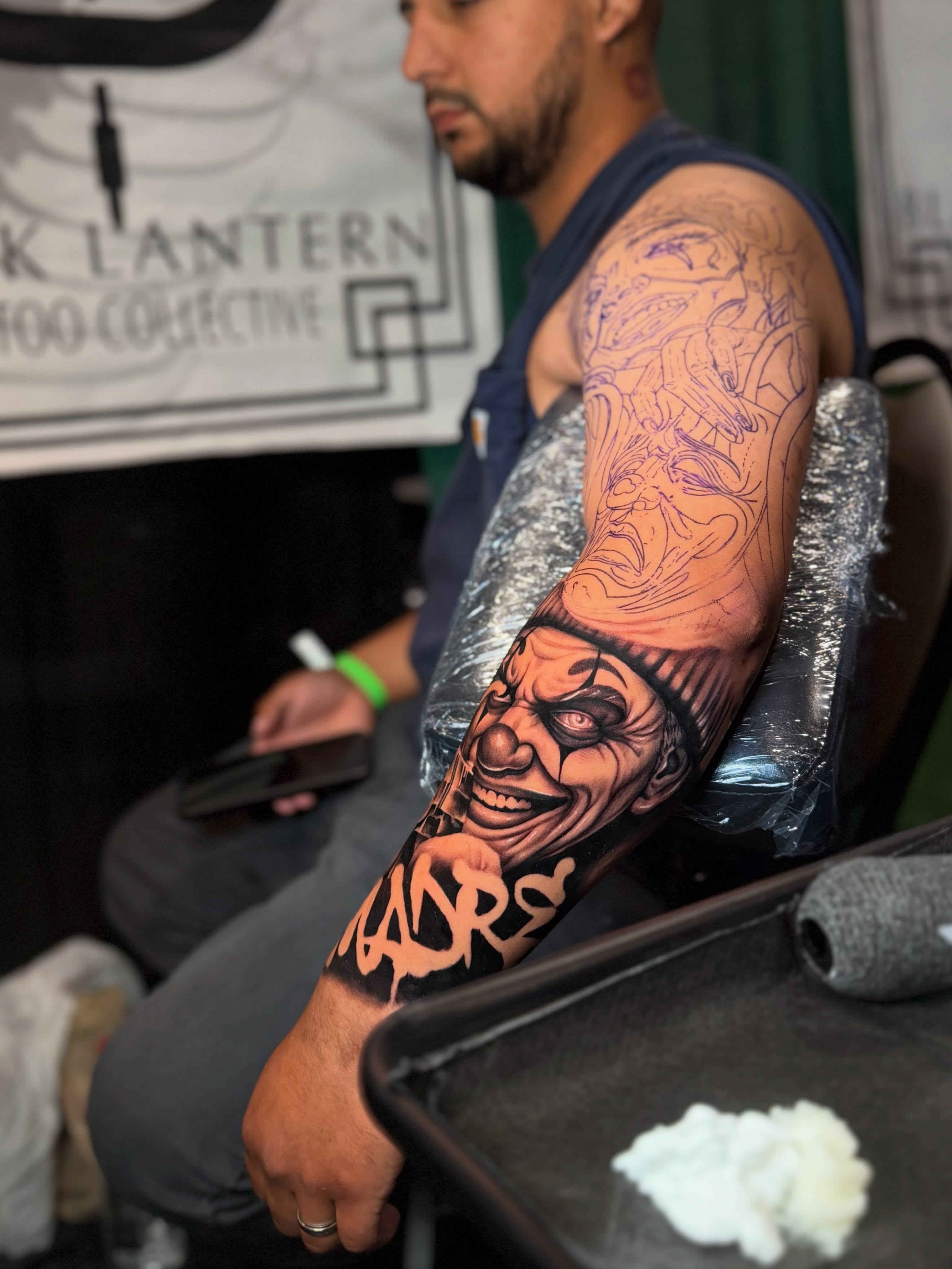 Clown face realism tattoo on the forearm by Sebastian Calderon