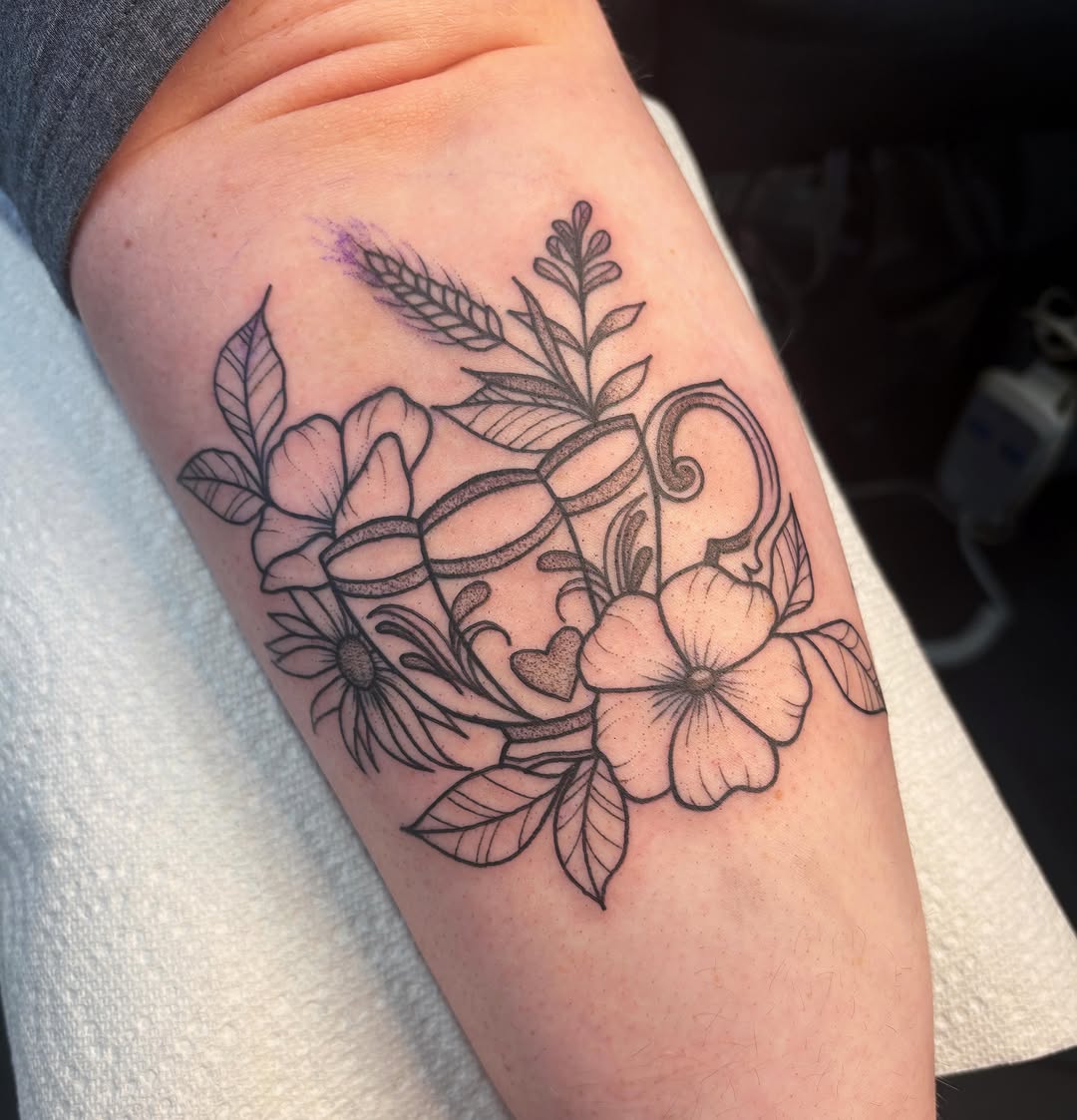 Flower arrangement black and grey tattoo on the forearm by Demi Flores 🖤