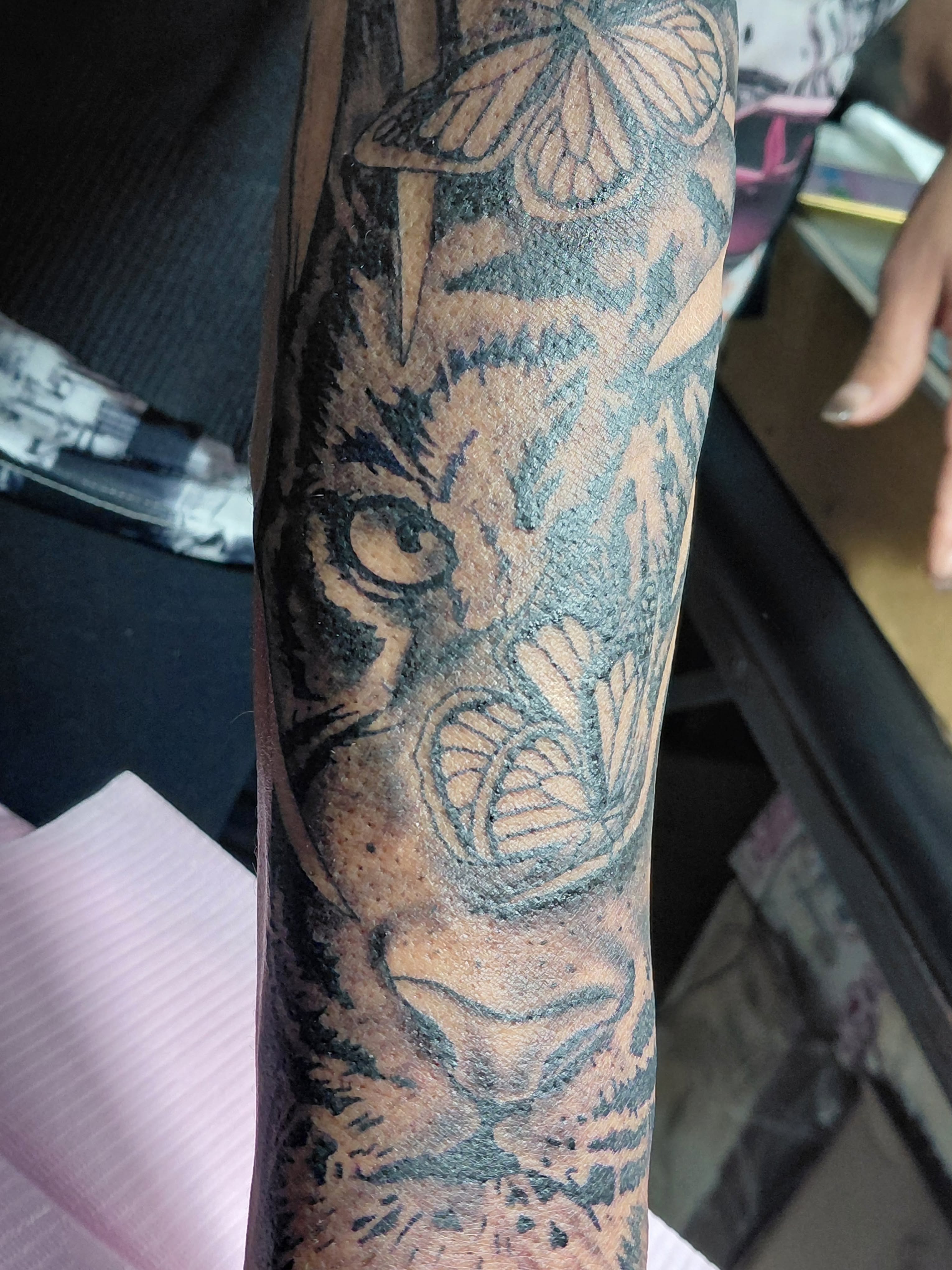 Tiger black and grey tattoo on the forearm by Jose Rodriguez