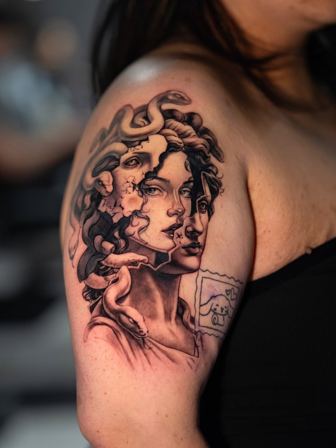 Medusa portrait with snakes realism tattoo on the shoulder by Joey Hella Tattoo Artist