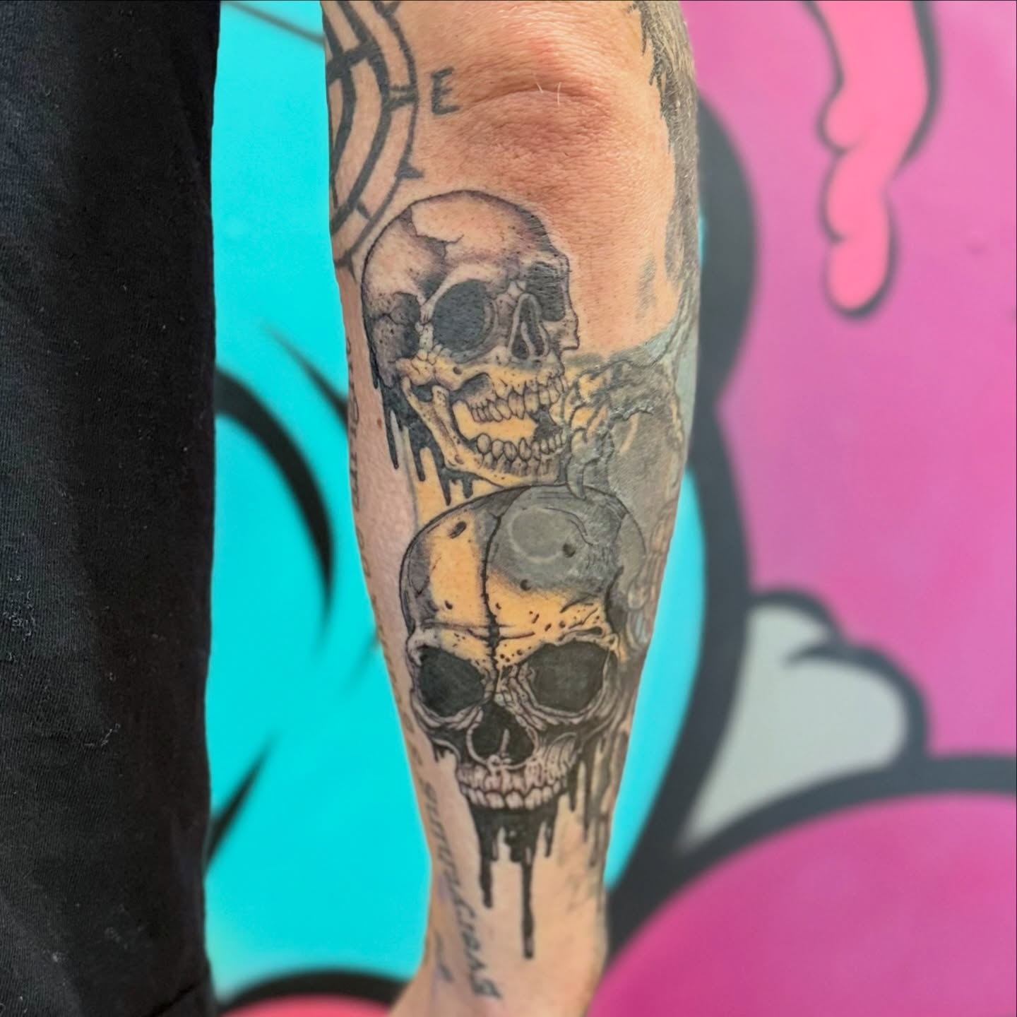 Skulls realism tattoo on the forearm by Chuckthegirl