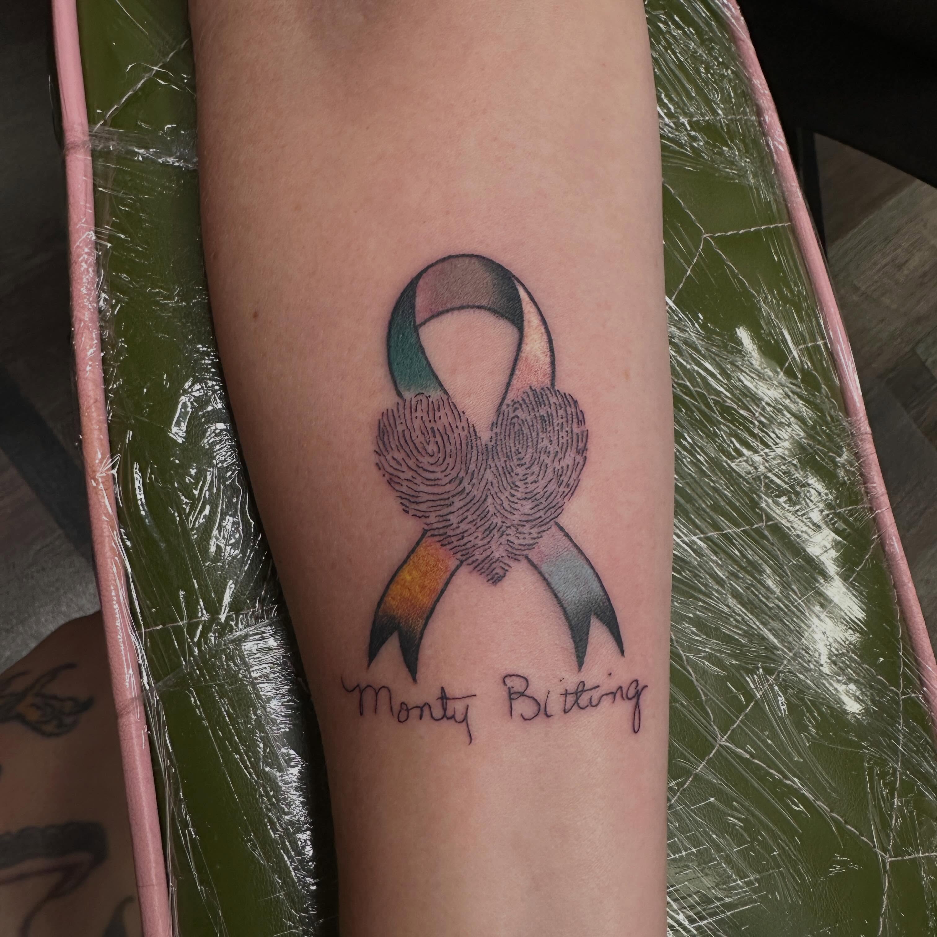 Fingerprint ribbon dotwork tattoo on the forearm by Shaila Roach Decorative & Cosmetic Tattooer