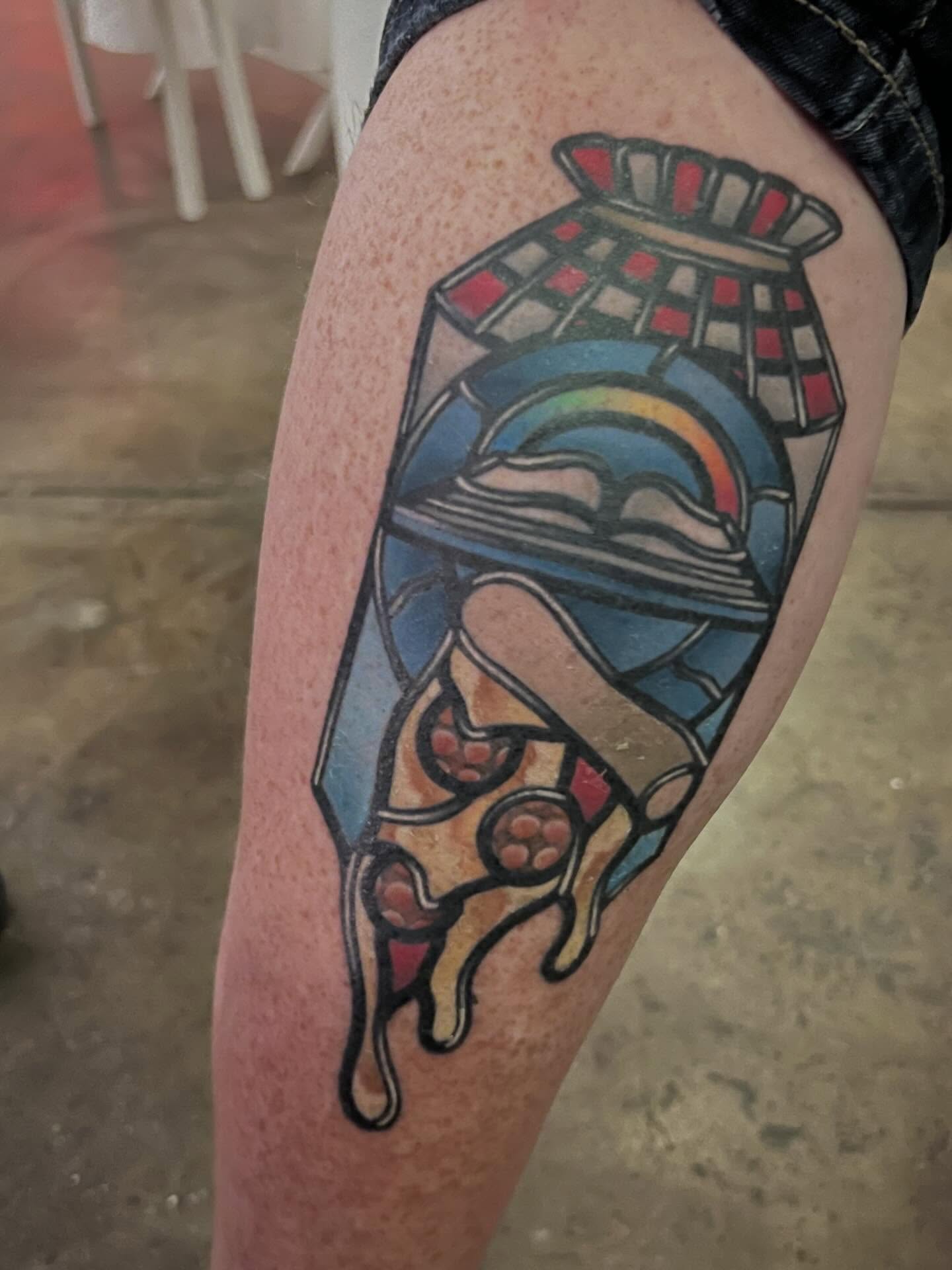 Pizza slice American traditional tattoo on the thigh by Katie Ann Tattoos