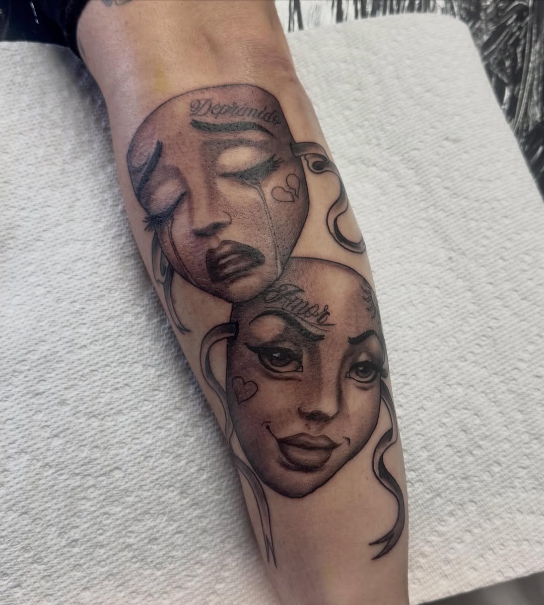 Faces realism tattoo on the forearm by Robbie Bryant