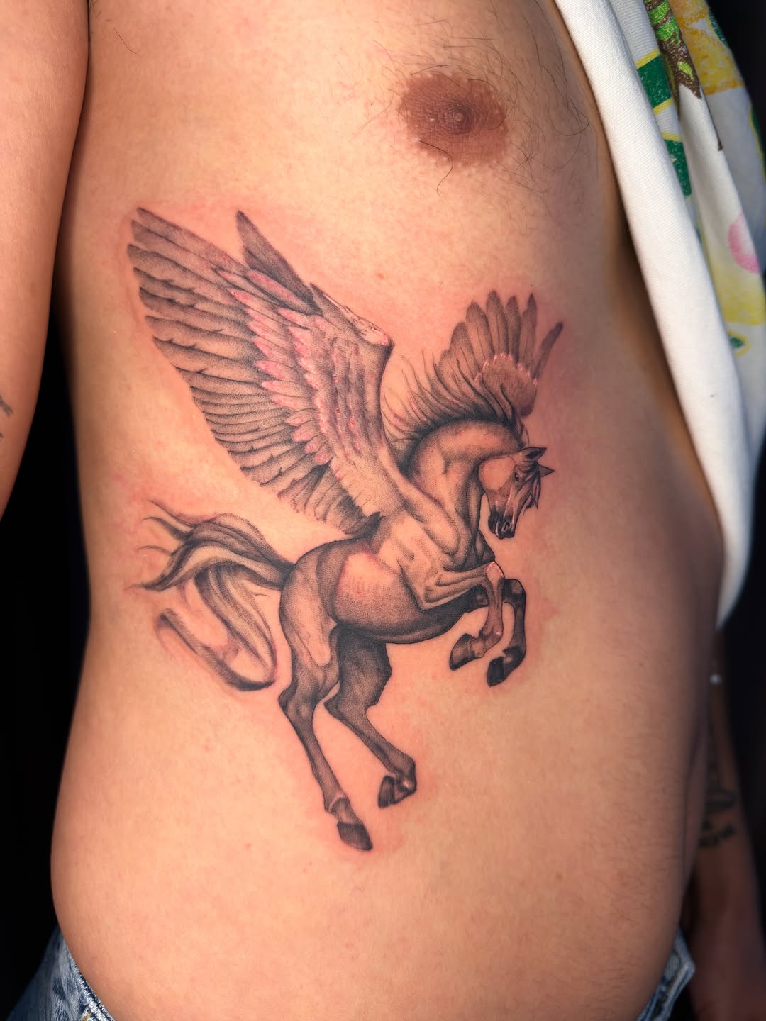 Tattoo by @heliast.tattoos — realism, black_and_grey