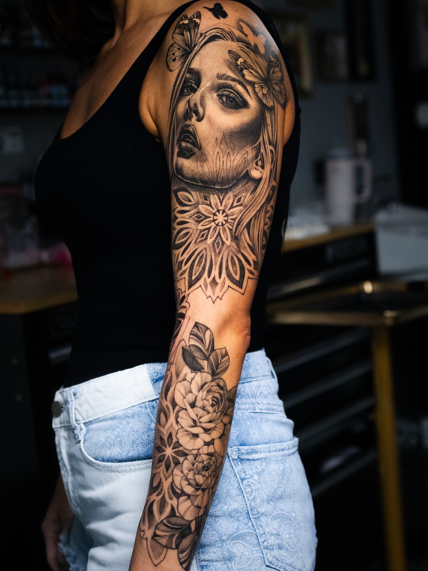 Tattoo by @tattoos_by_lo — realism, black_and_grey