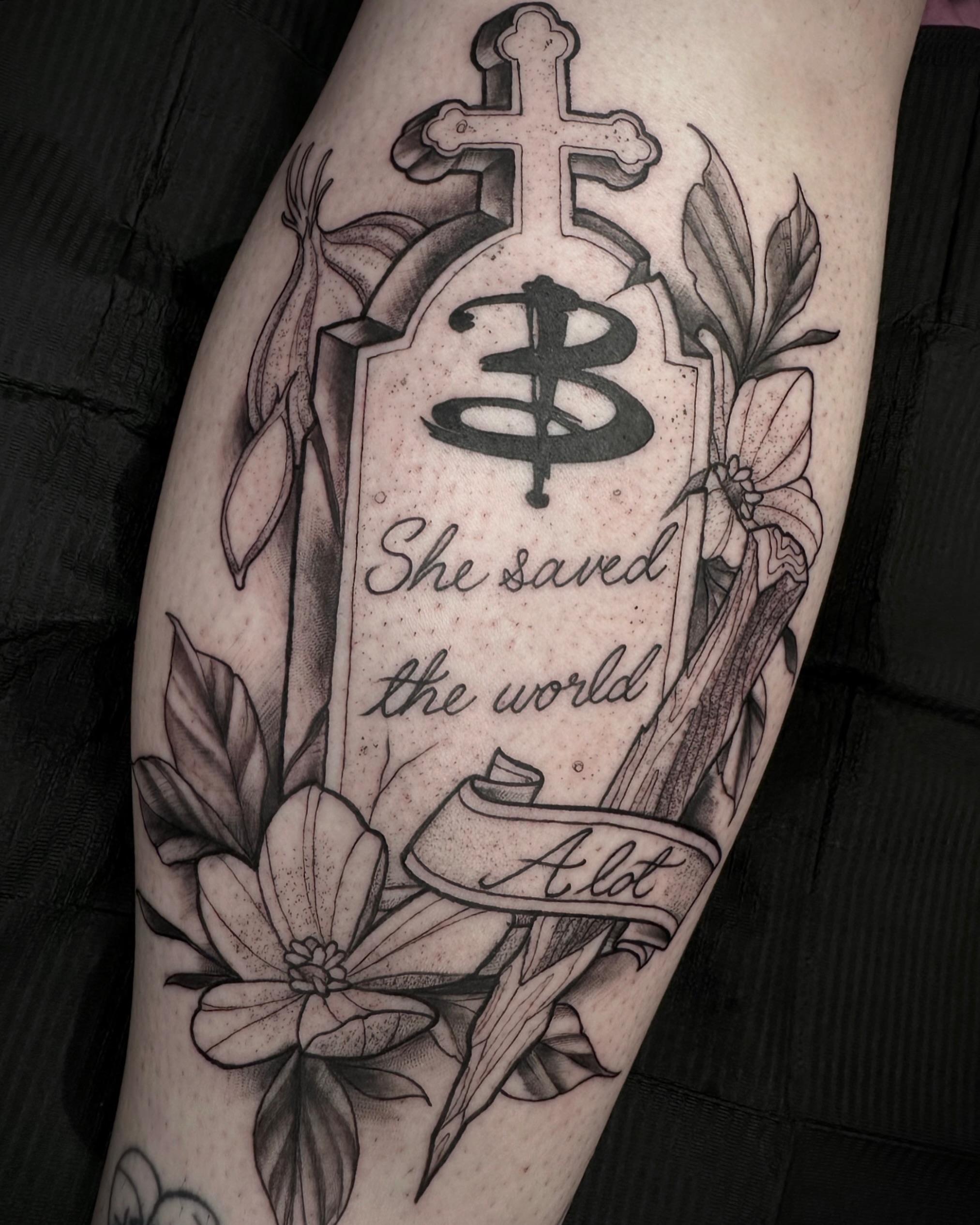 Gravestone with text black and grey tattoo on the forearm by Jenn Golgan