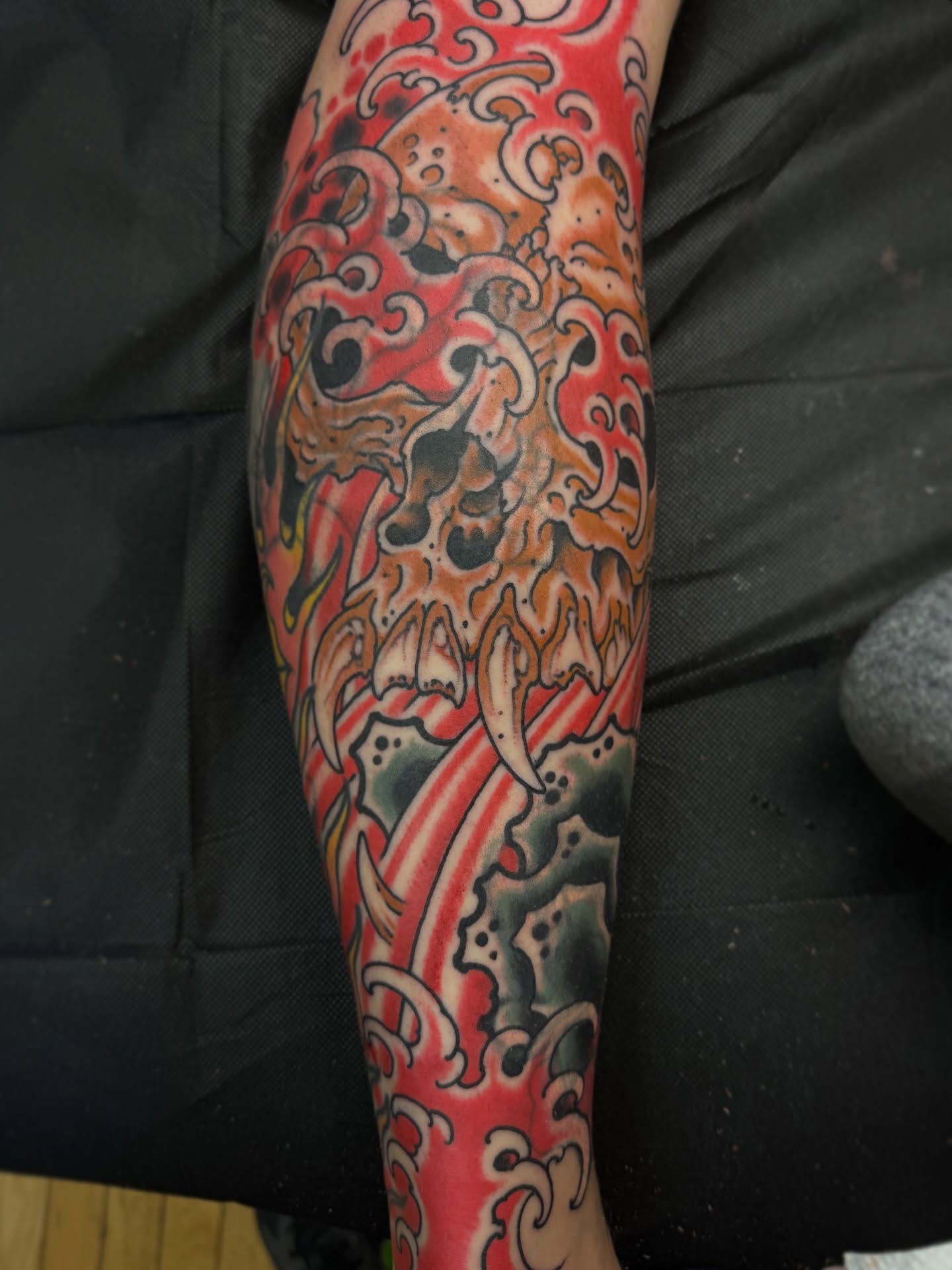 Lion japanese irezumi tattoo on the forearm by J Ranno, Richmond, Virginia