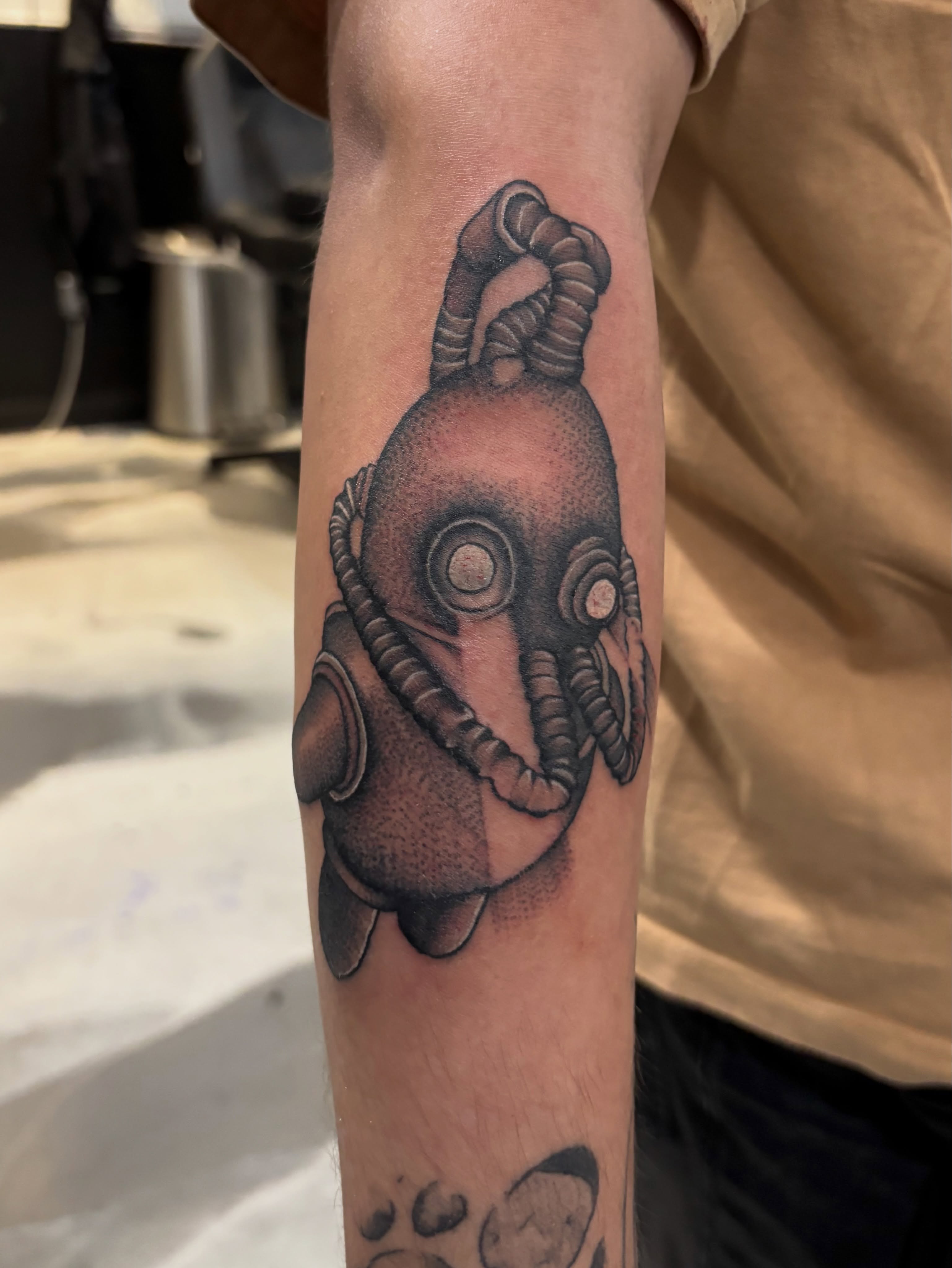 Cyborg head dotwork tattoo on the forearm by Miklo Montoya