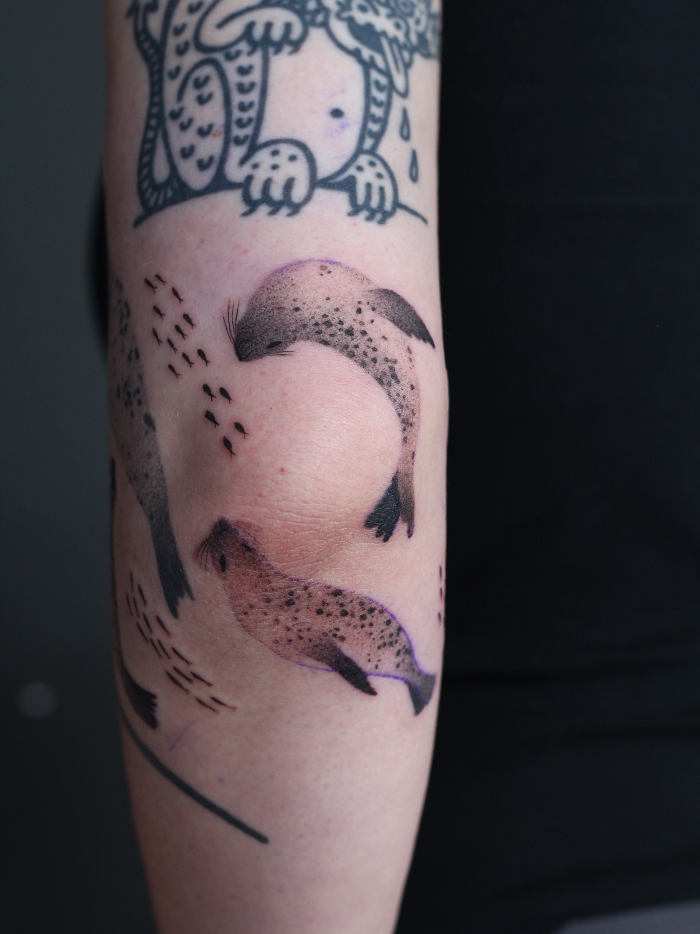 Seals dotwork tattoo on the forearm by Stephany Victorine