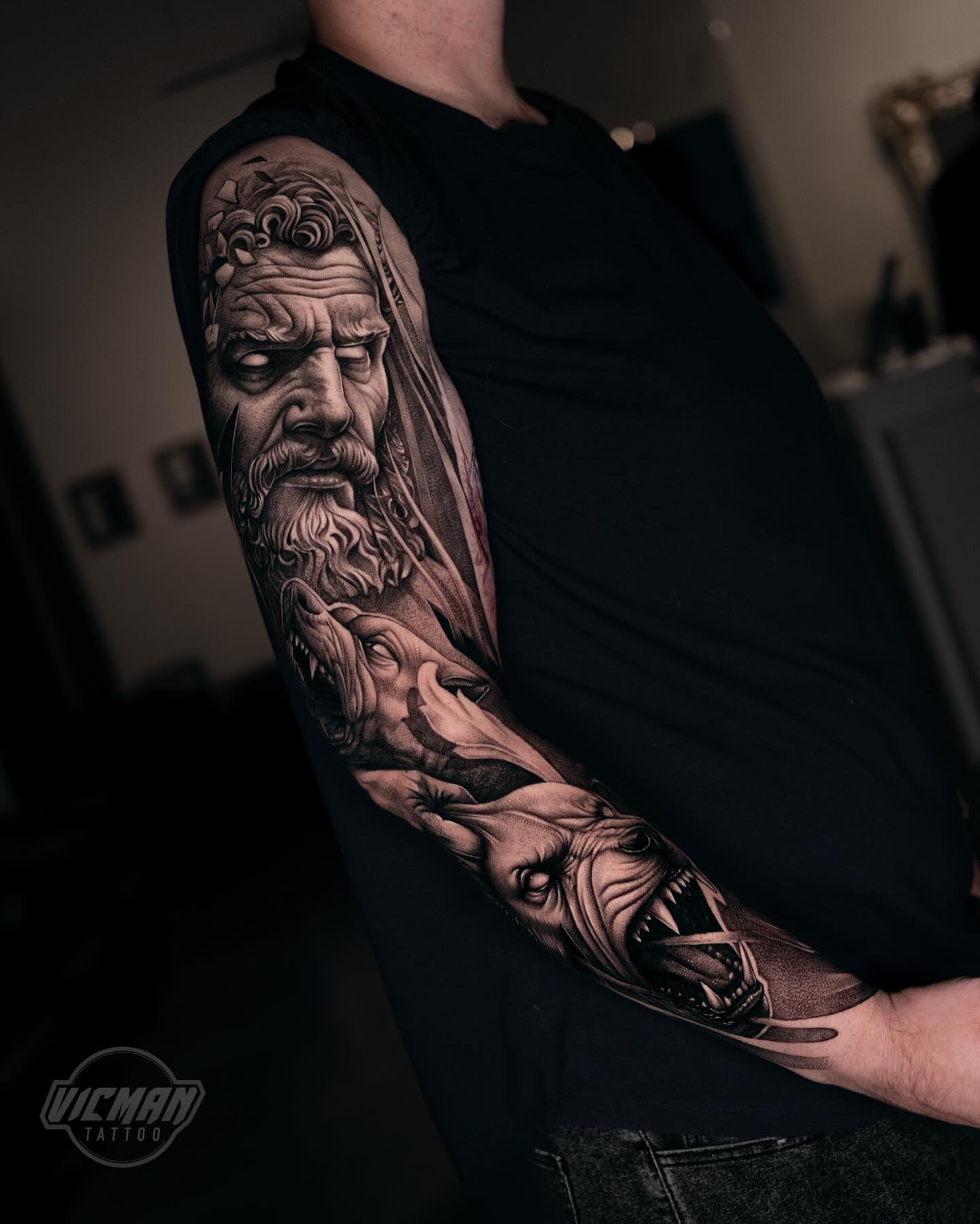 Tattoo by @vicmantattooartist — realism, black_and_grey