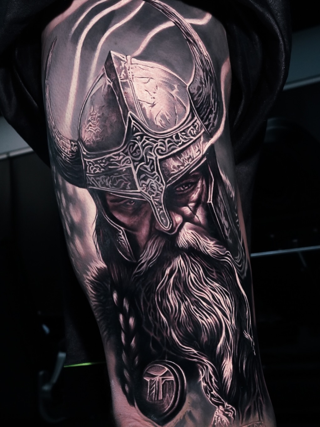 Viking portrait realism tattoo on the forearm by George Lange