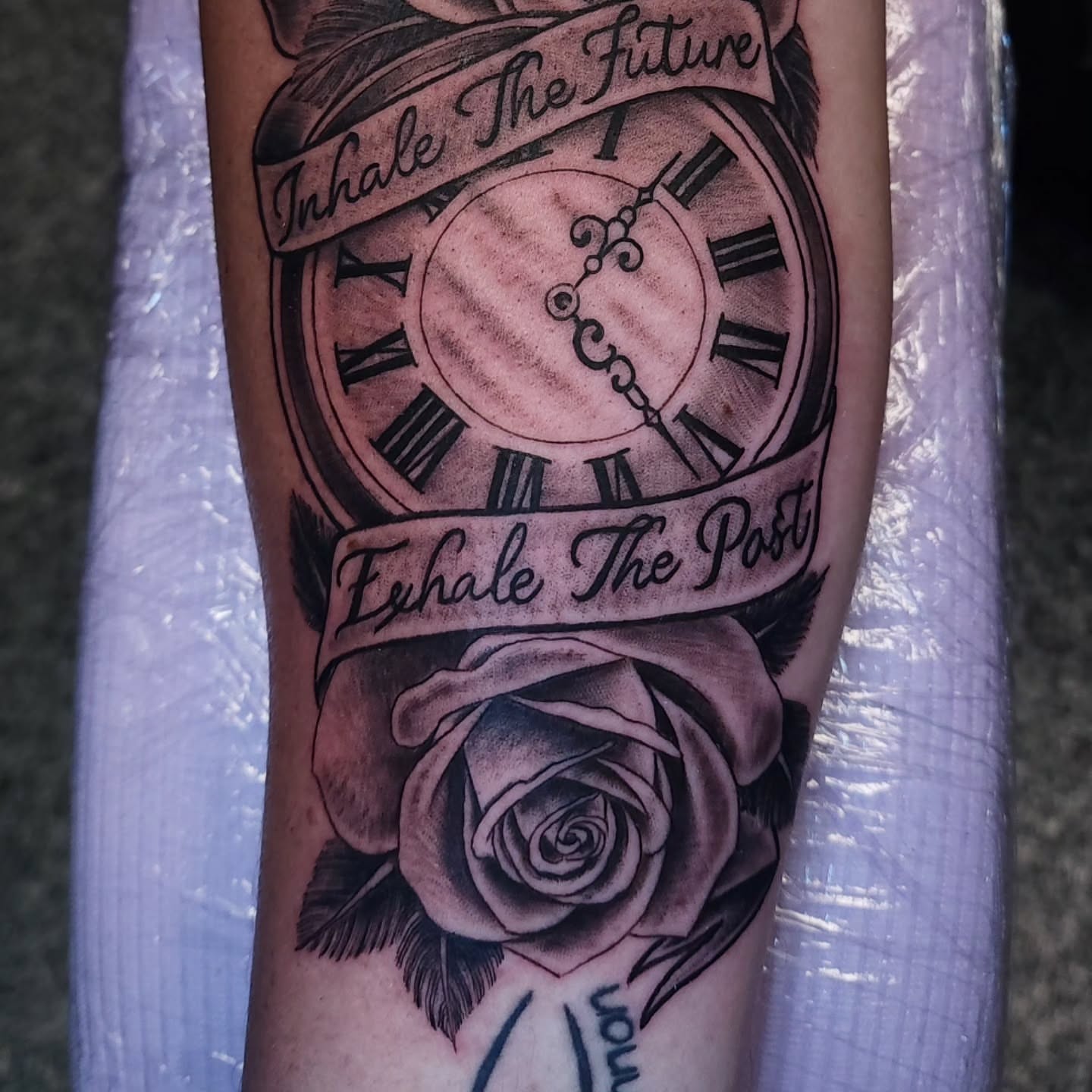 Clock and rose black and grey tattoo on the forearm by xavia