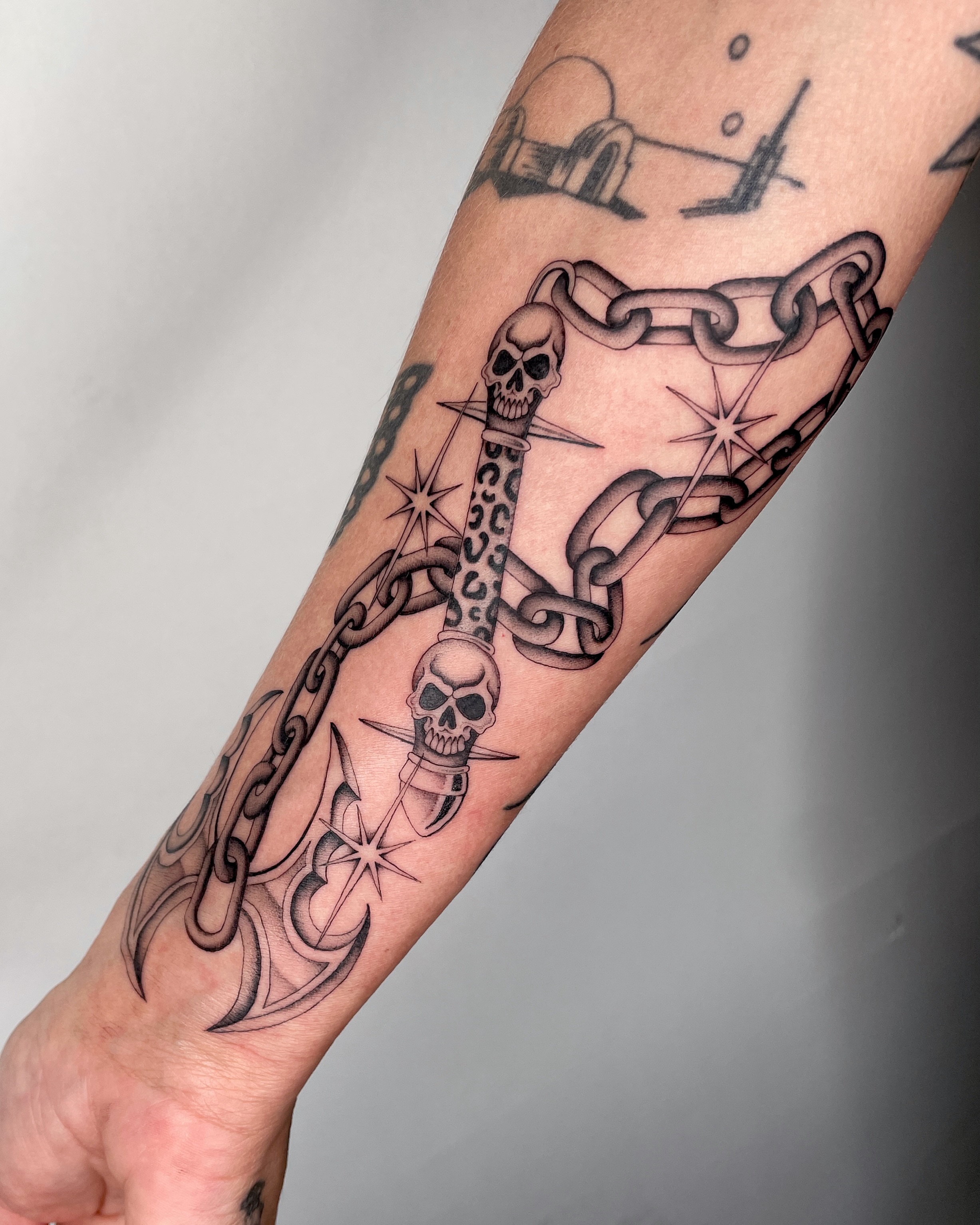 Anchor and chains realism tattoo on the forearm by IVY