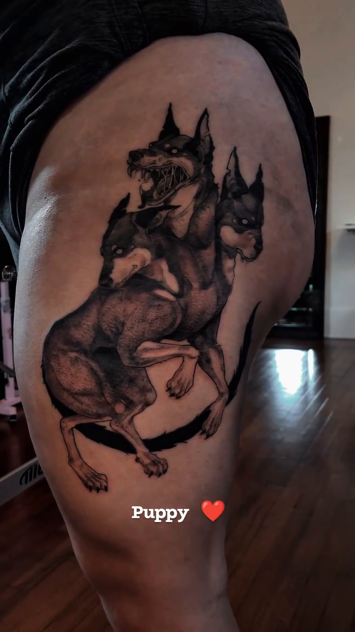 Cerberus tattoo realism tattoo on the thigh by Shannon