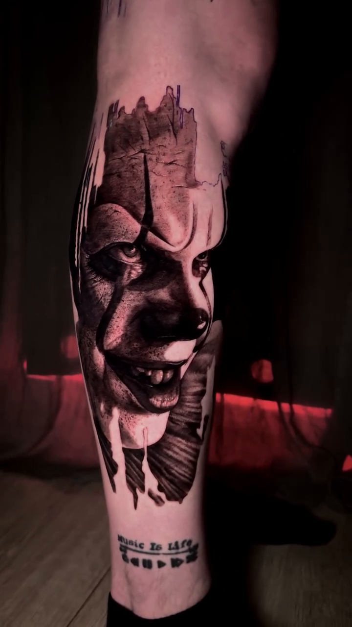 Scary clown face realism tattoo on the forearm by πΈπππ πππ€