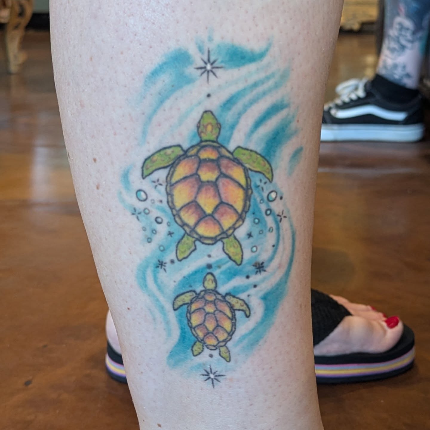 Sea turtles watercolor tattoo on the leg by Raven FM-Tattoo Apprentice