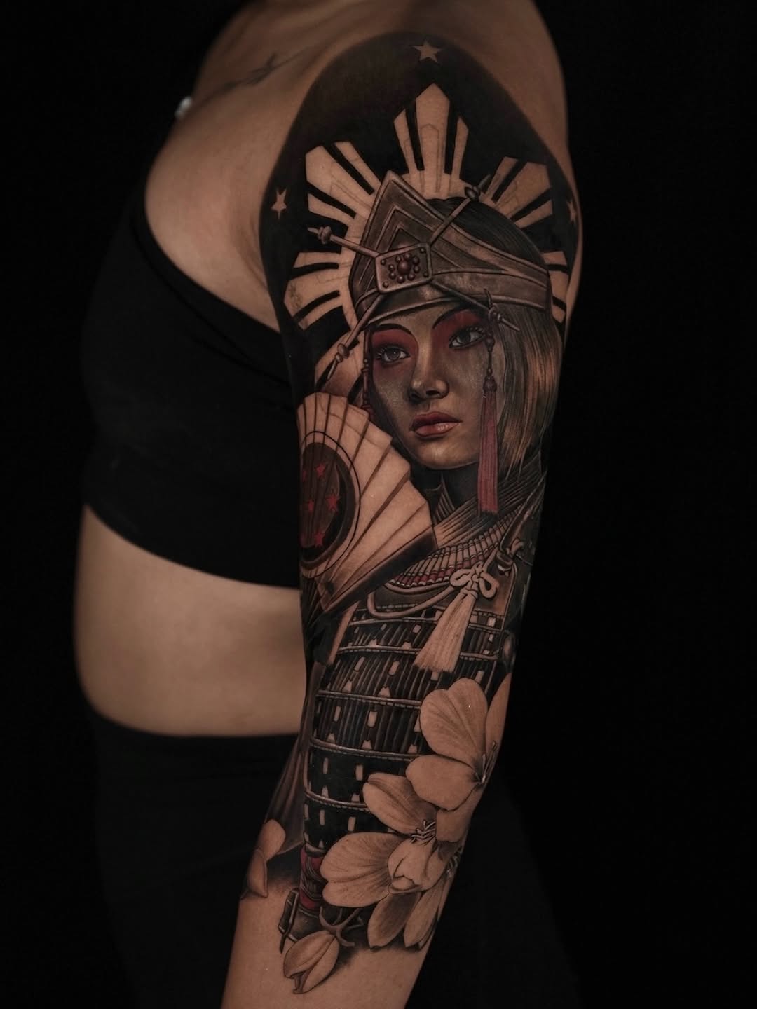 Samurai woman with fan and flowers realism tattoo on the forearm by Lynn Hoang, Honolulu, Hawaii